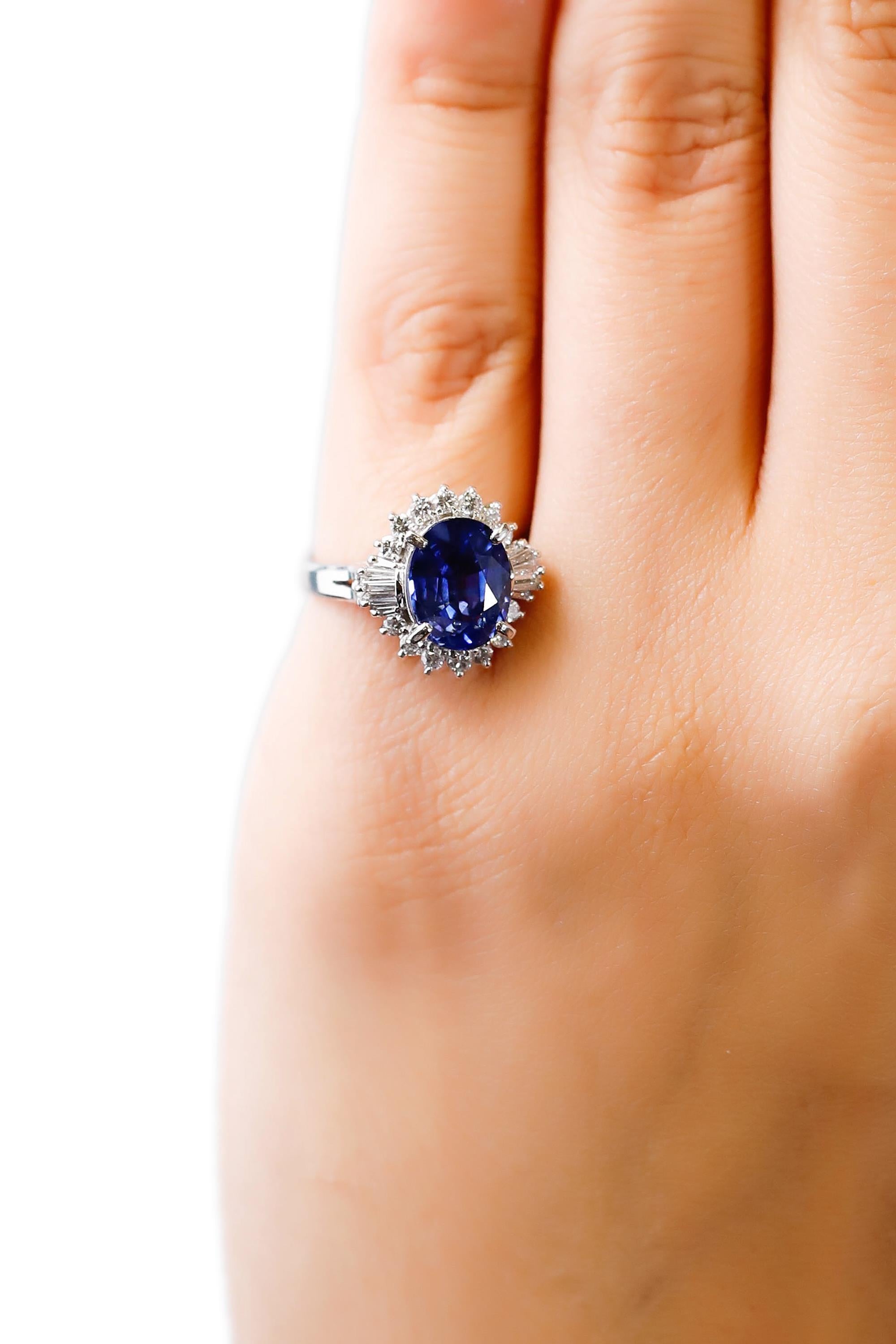 3.11 Carat Oval Blue Sapphire 0.61 Carat Diamond Platinum Halo Ring Engagement For Sale 1
