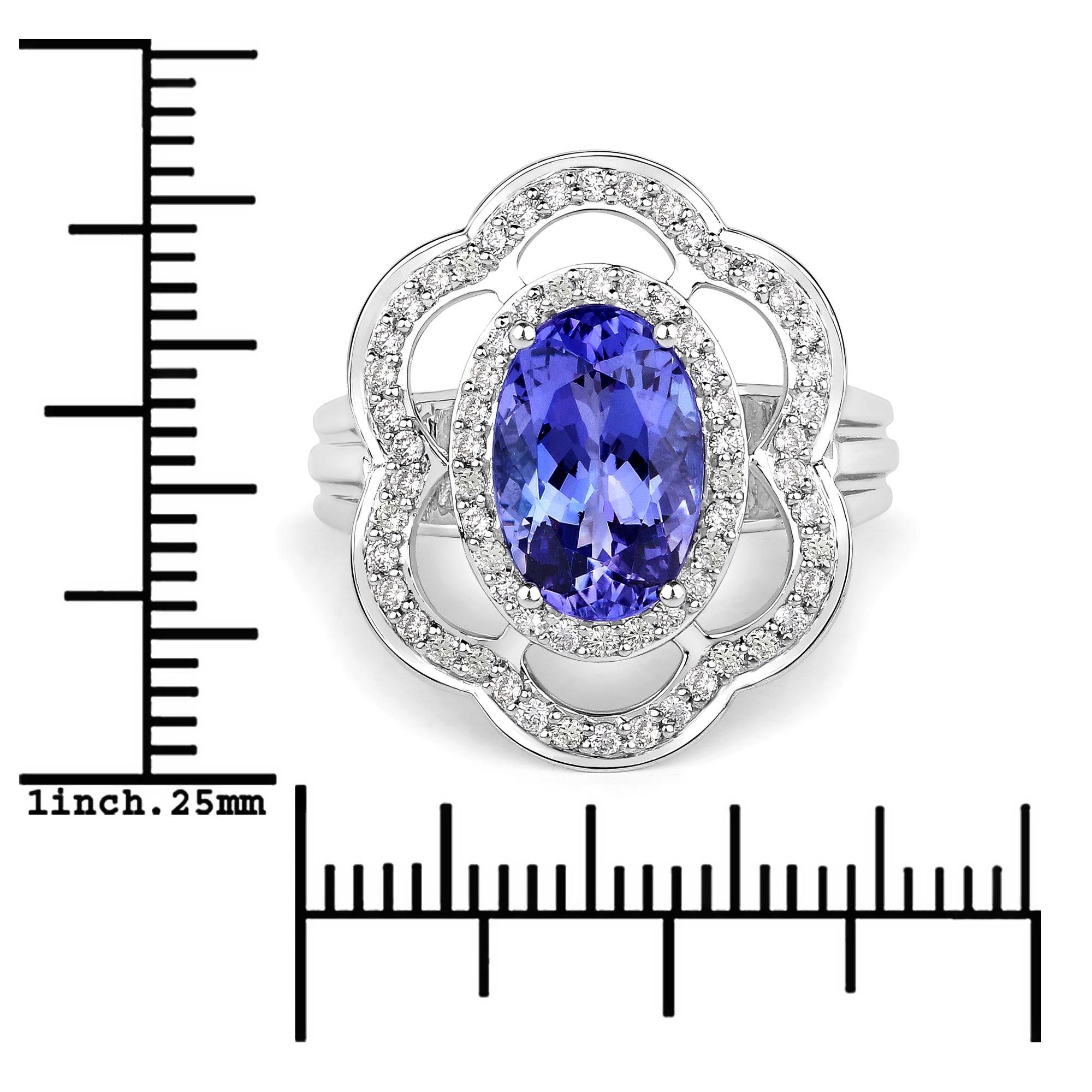 3.12 Carat Genuine Tanzanite and White Diamond 14 Karat White Gold Ring In New Condition In Great Neck, NY