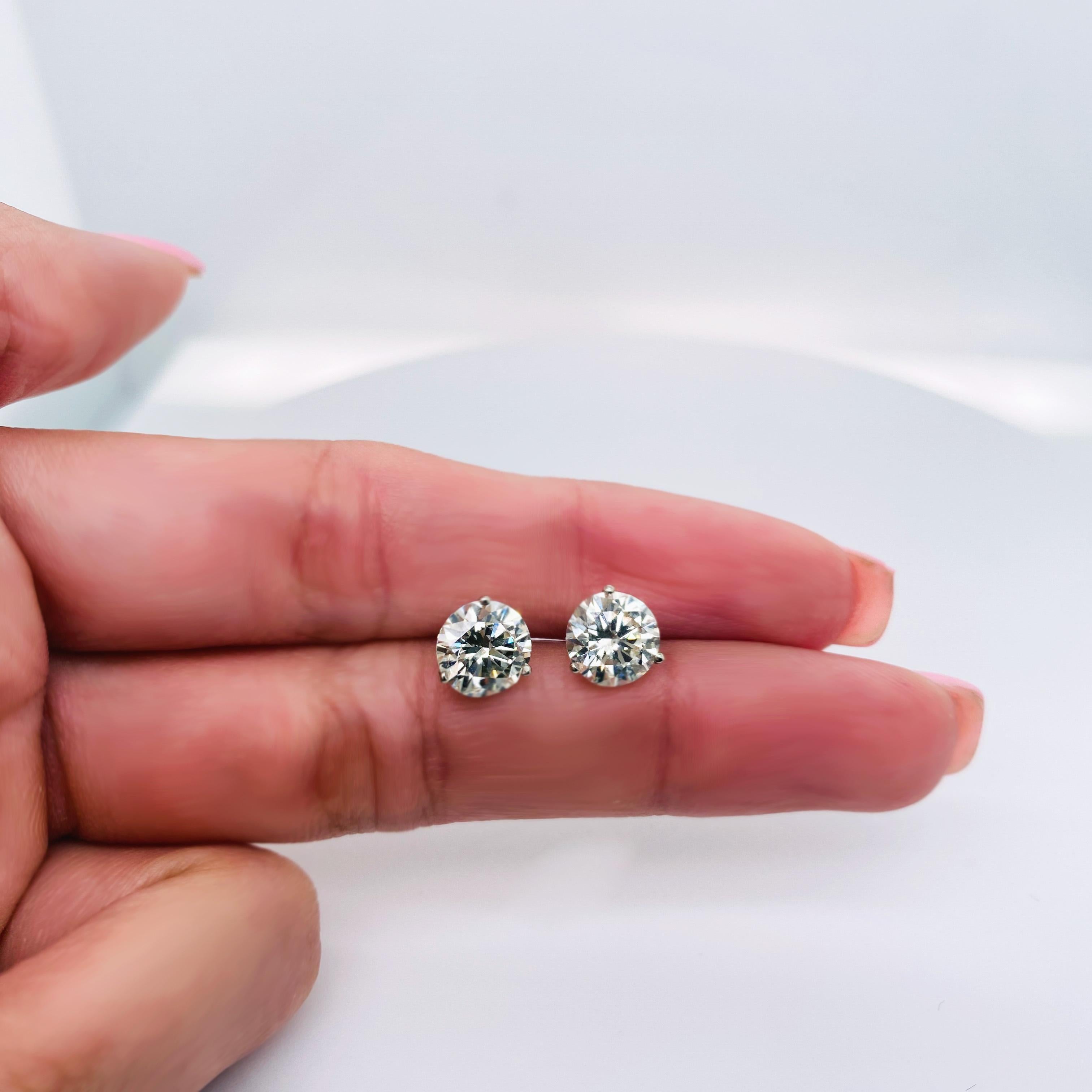 These stunning martini stud diamond earrings are perfect for any ear! Wear them alone or next to other favorite earrings. Martini studs are popular because they have a low profile close to the ear and still keep the stone proudly displayed for