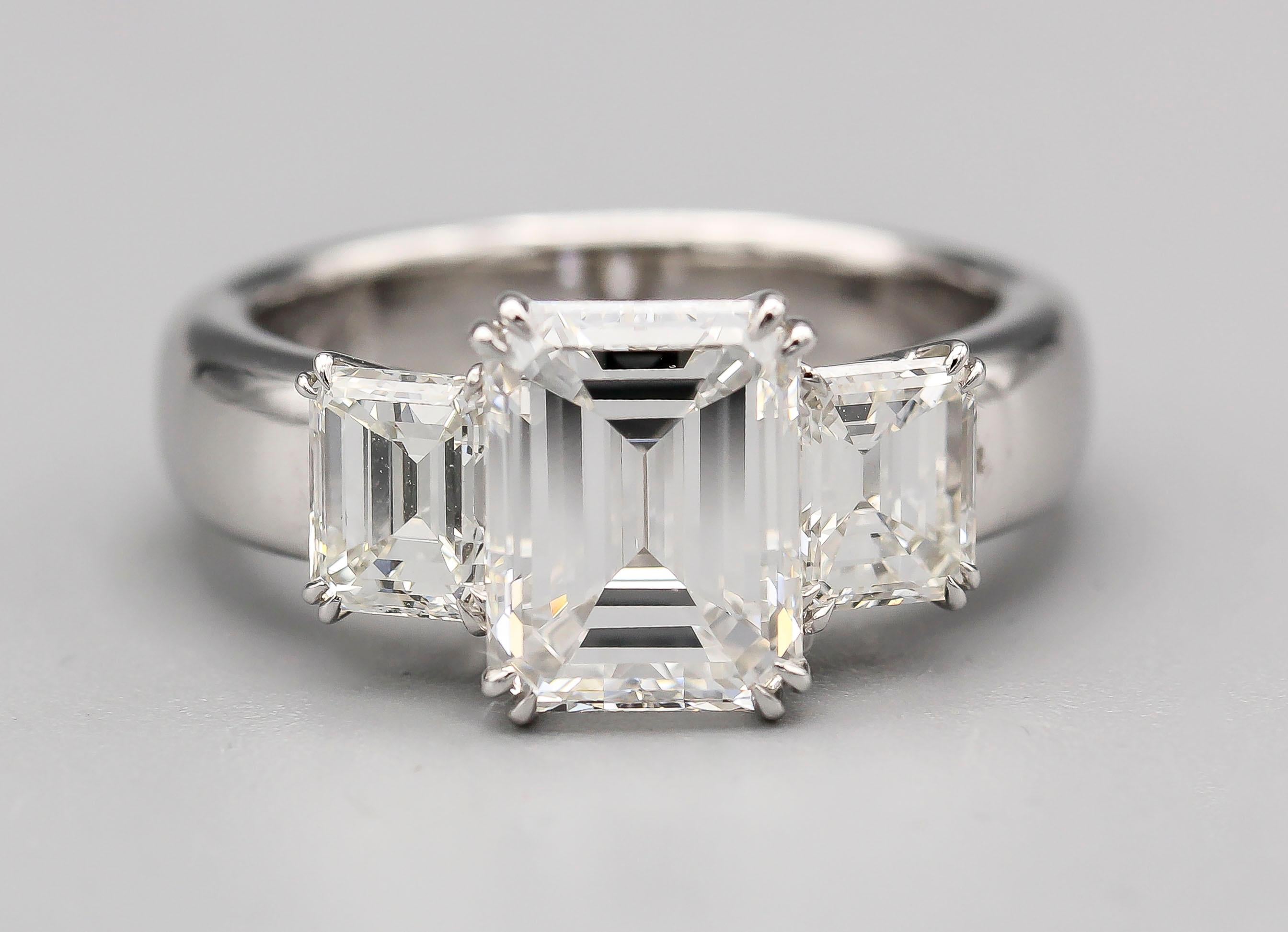 3.12 E/VVS1 Carat Emerald-Cut Diamond Platinum 3 Stone Ring 4