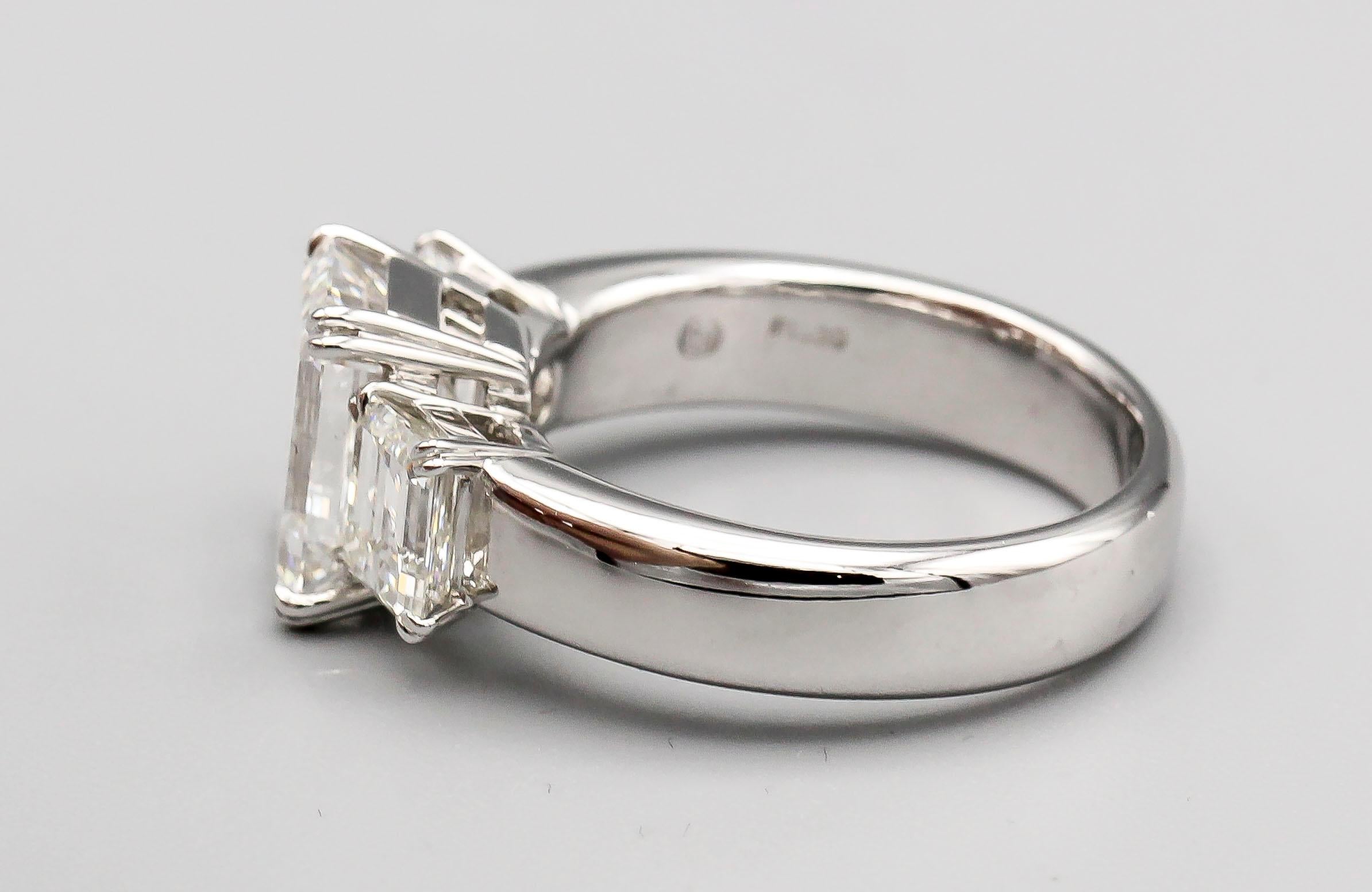3.12 E/VVS1 Carat Emerald-Cut Diamond Platinum 3 Stone Ring 1