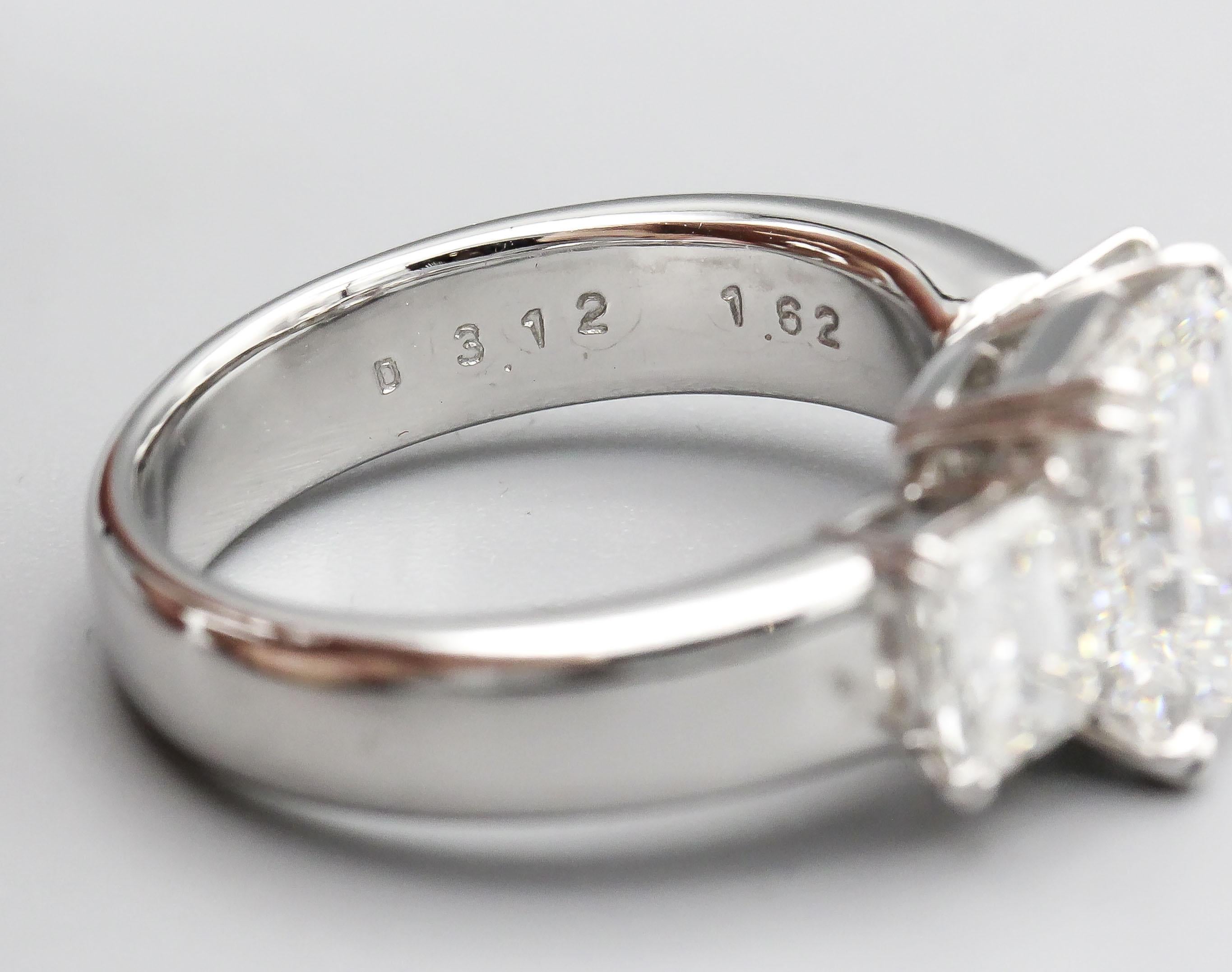 3.12 E VVS1 Emerald Cut Diamond with 1.62 Side Stones Engagement Ring For Sale 2