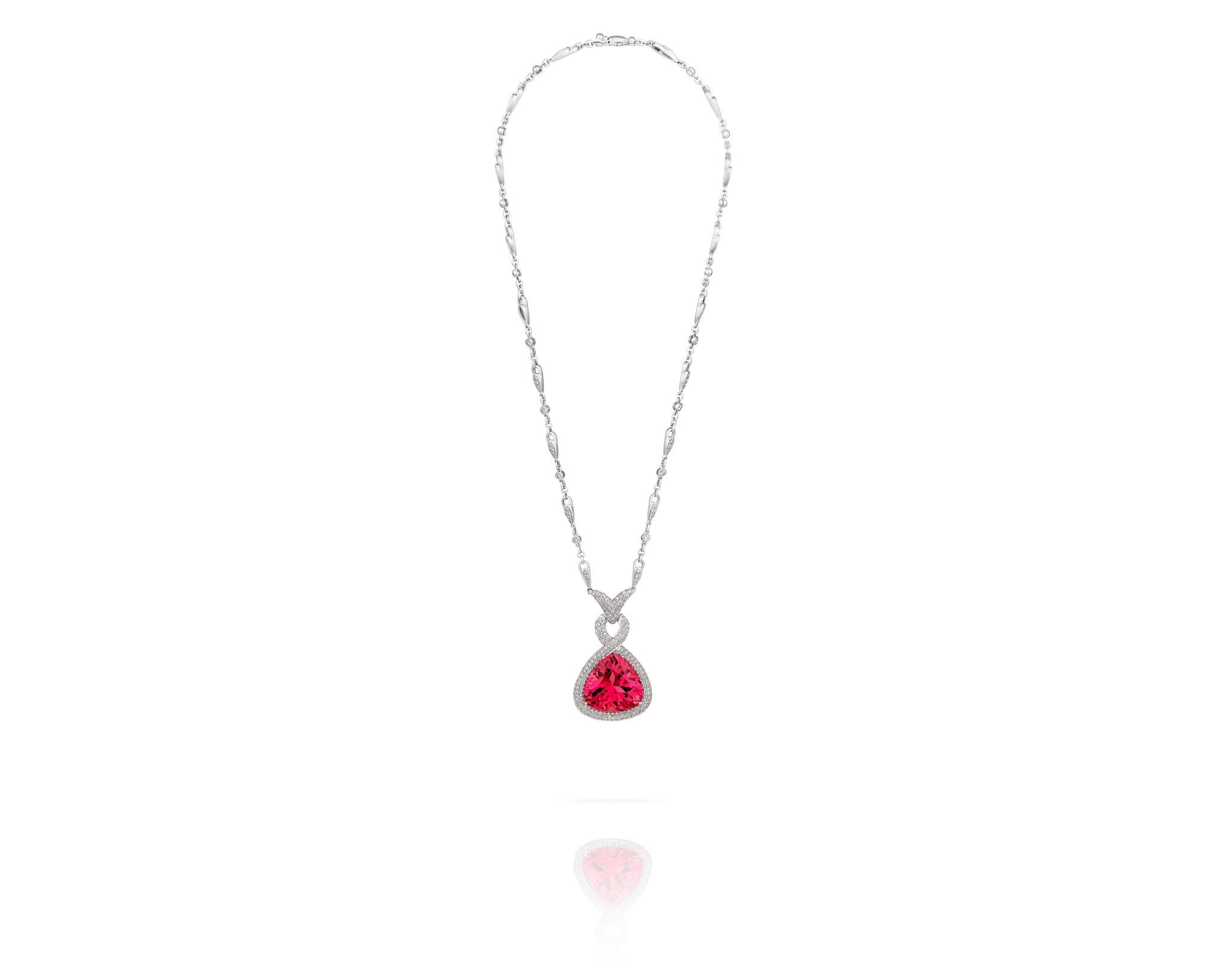 A Beautiful 31.24ct Pink Tourmaline Pear-Shaped Stone surrounded by 4.38ct of Diamonds on an 18kt White Gold Chain. With the highest quality materials and intricate design, this piece will make you feel like you're a royal in the Renaissance Age.