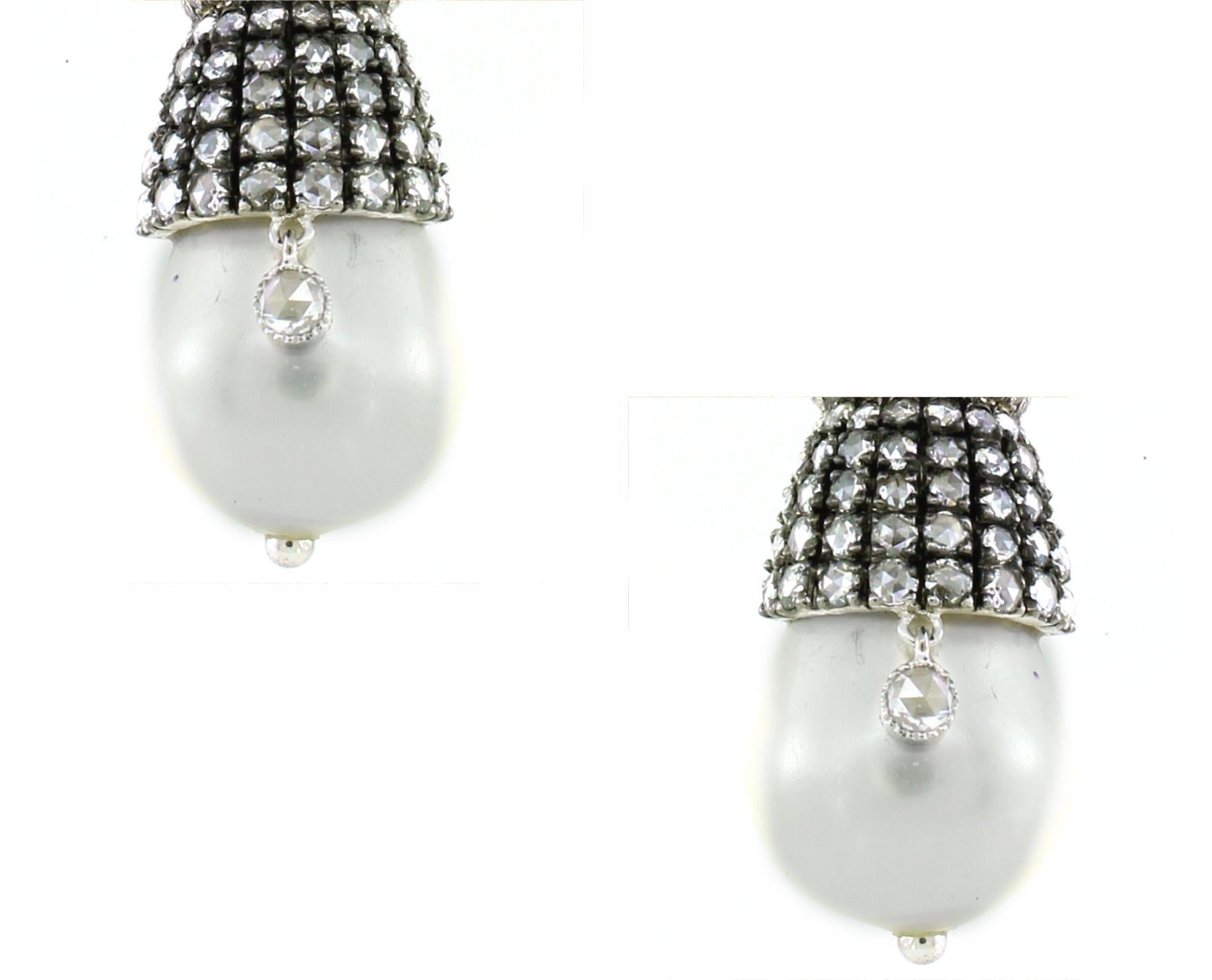 Oval Cut 31.26 carats of Pearl Drop Earrings For Sale