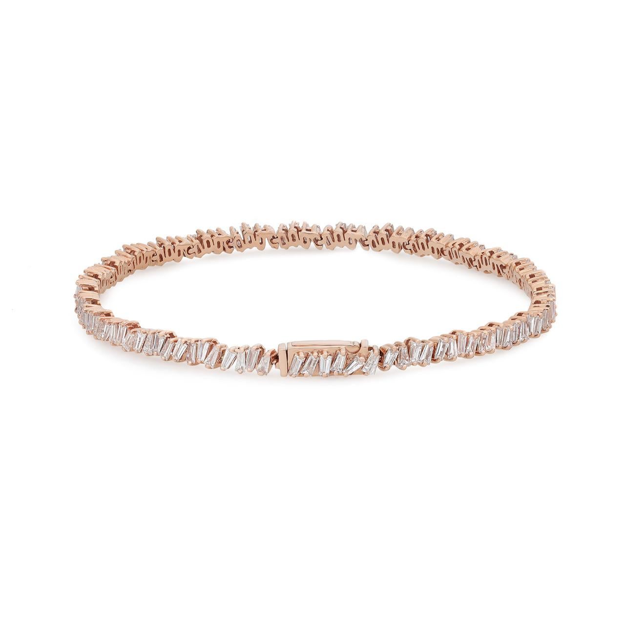 Embrace the exquisite brilliance of the 3.13 Carat Baguette Cut Diamond Tennis Bracelet in 18K Rose Gold, a masterpiece of goldsmithing. This stunning creation showcases the highest level of craftsmanship, resulting in a truly dynamic piece. The