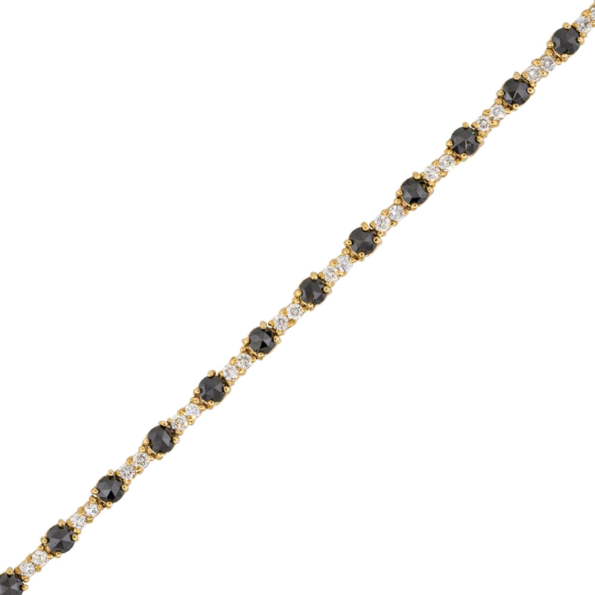 Material: 14k yellow Gold
Diamond details: Approx. 2.25ctw of round cut diamonds. Diamonds are Fancy Black in color and VS in clarity
                             Approx. 0.88ctw of round cut diamonds. Diamonds are H in color ands VS in