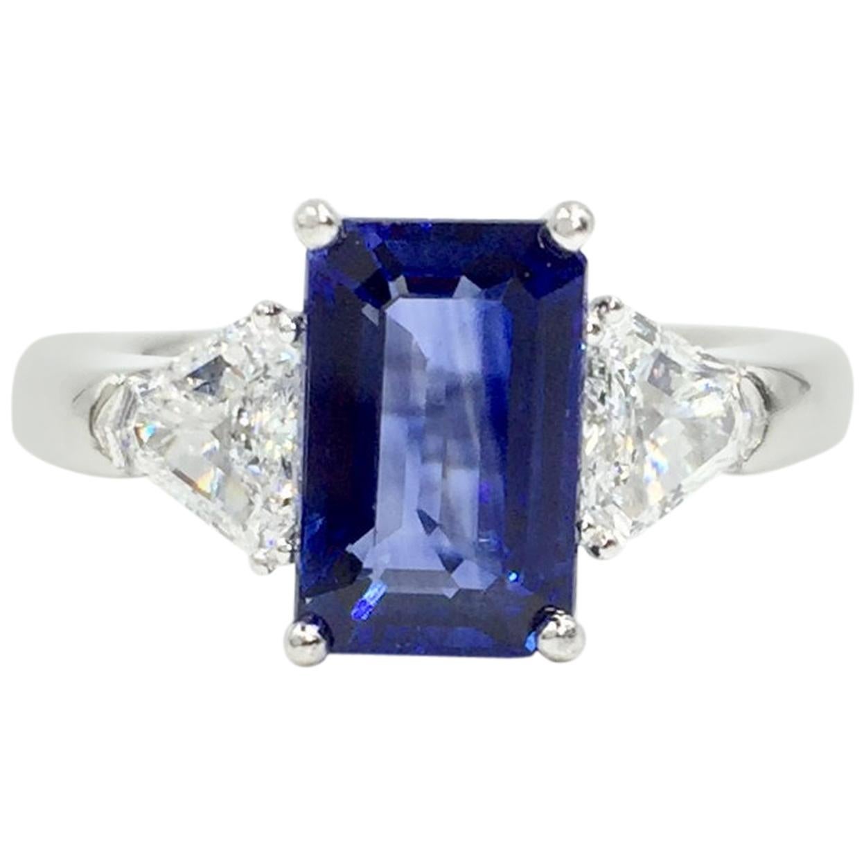 3.13 Carat Blue Sapphire Platinum Ring with Trillion Diamonds