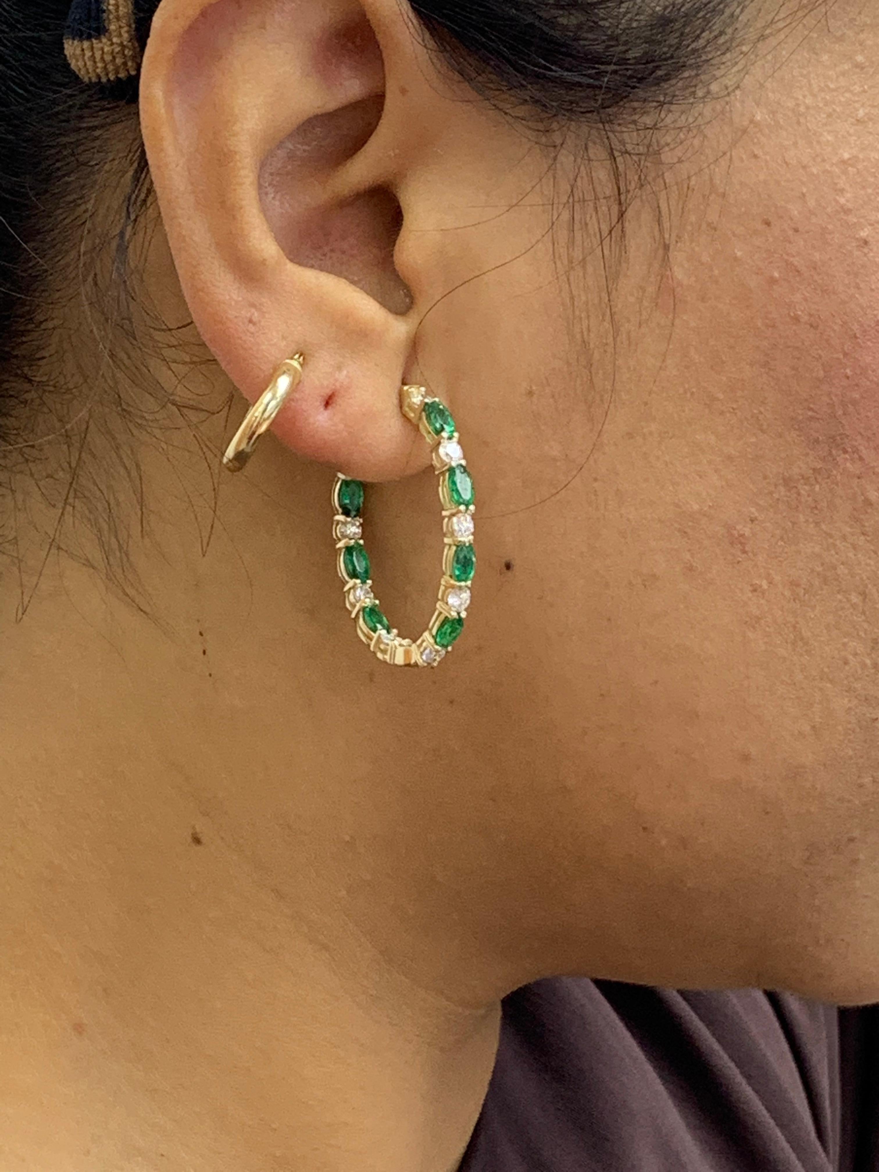 Women's 3.13 Carat Oval Cut Emerald and Diamond Hoop Earrings in 14K Yellow Gold For Sale