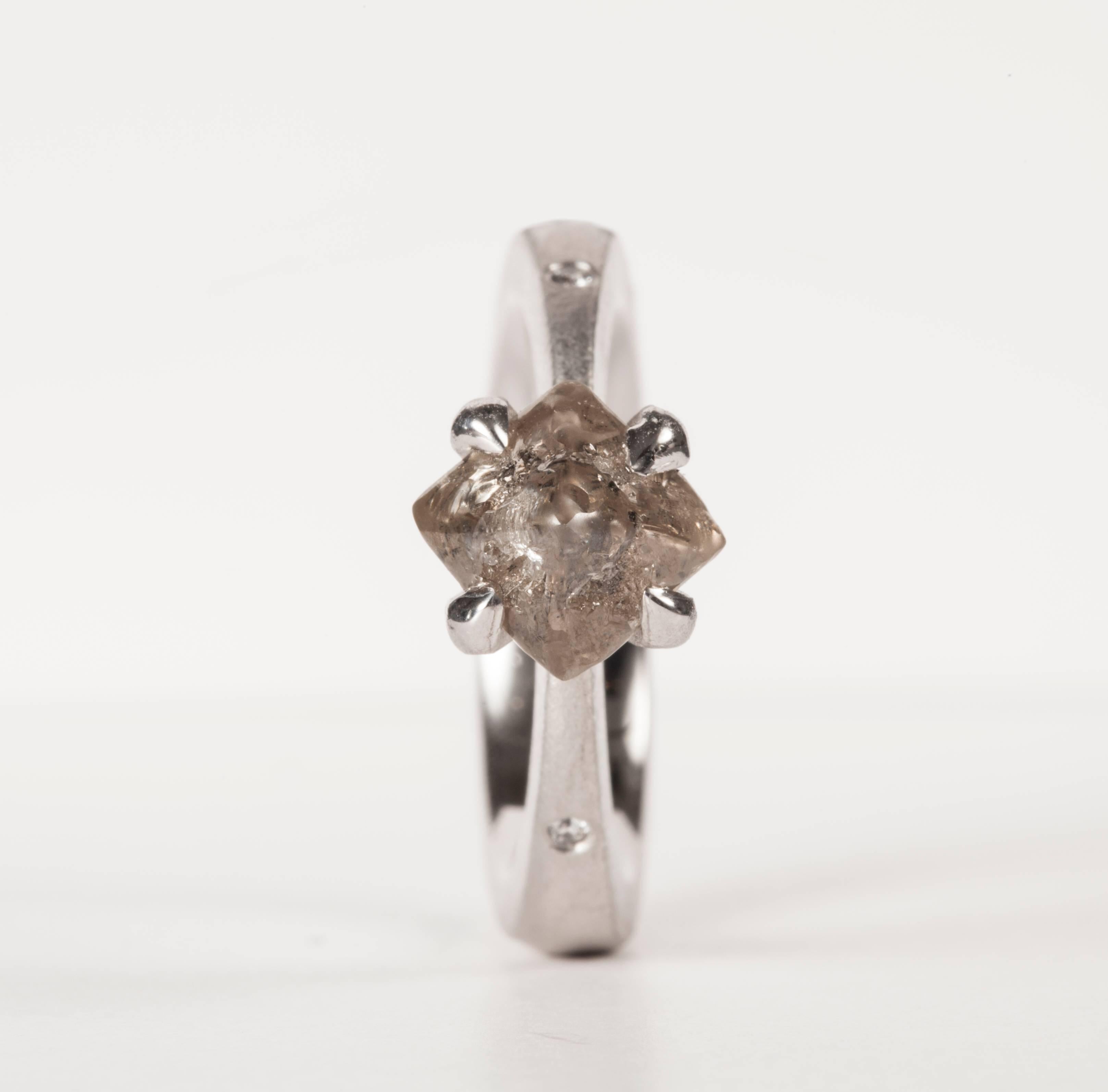 3.13 ct. Natural Octahedron Rough diamond & 0.02 ct. TW/VVS Brilliants in 14K handcrafted white gold ring.

Every rough diamond from Roughdiamonds dk has been personally handpicked by Maya Bjørnsten. The diamonds we reject are sent back to be cut