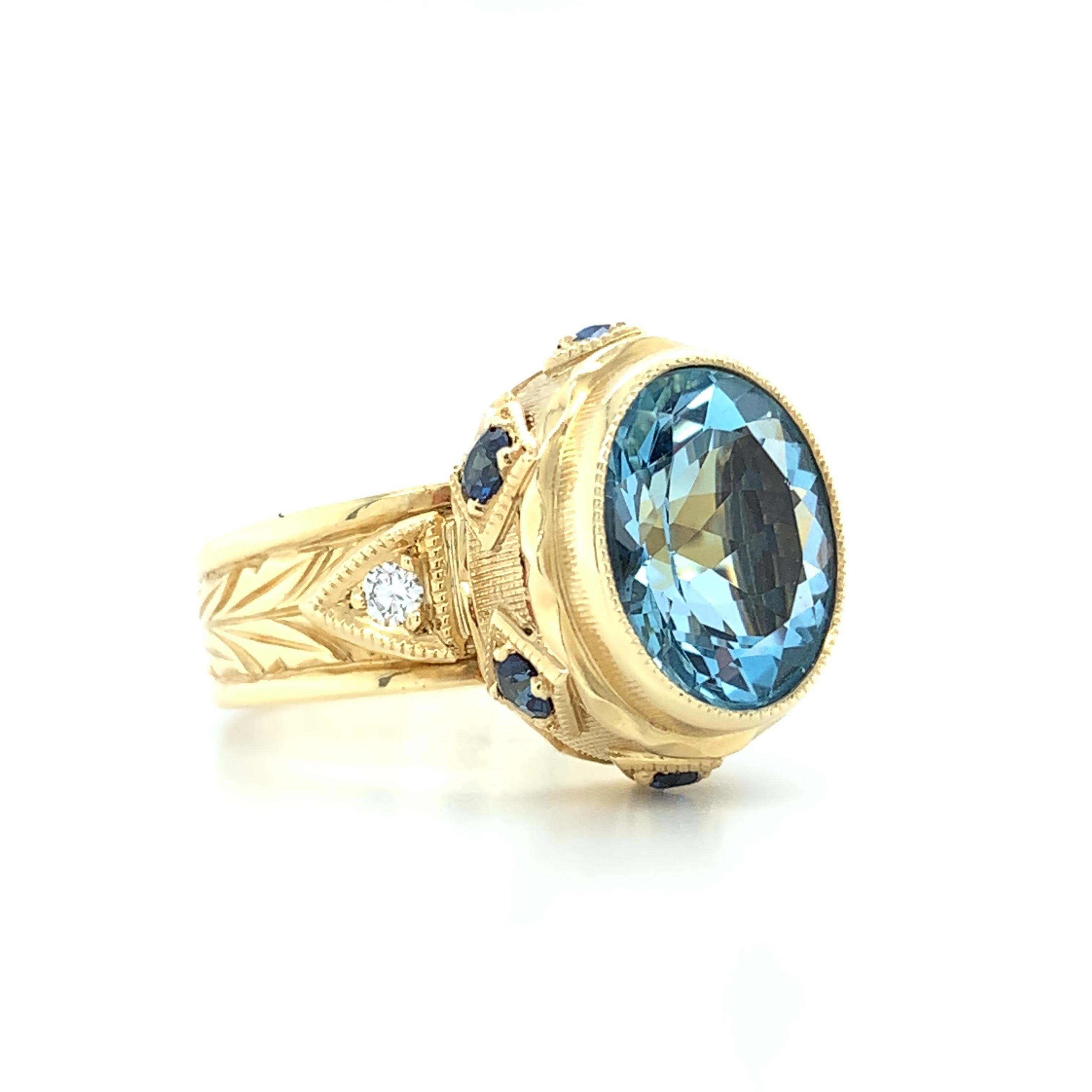 Oval Cut 3.13 ct. Aquamarine, Blue Sapphire, Diamond Yellow Gold Engraved Bezel Band Ring