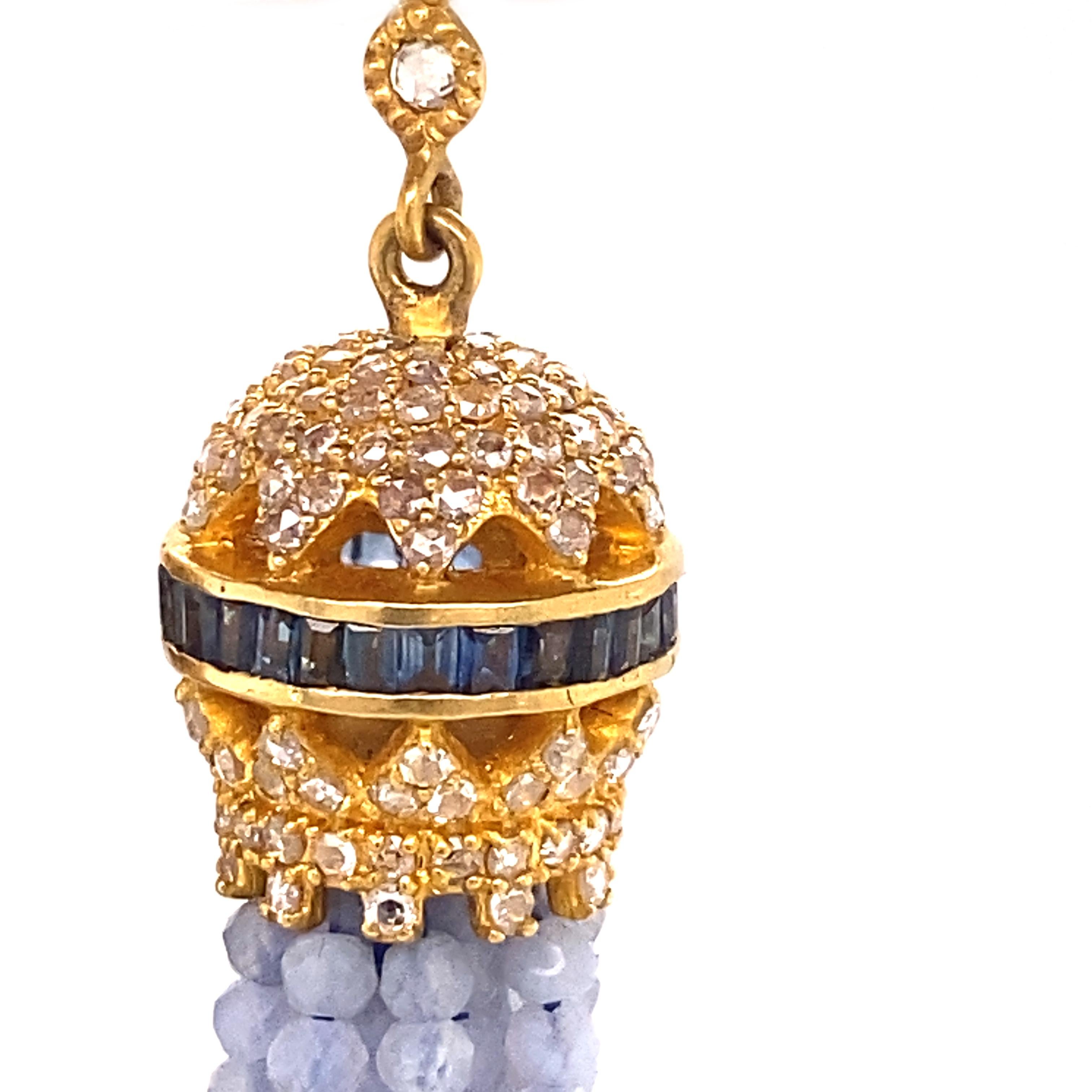 Sagrada Halo Earrings Set In 20 Karat Yellow Gold with 31.37 Carat Chalcedony, 1.12 Carat Blue Sapphire, and 7.23 Carat Diamonds. Measuring 3.5 Inches In Length, Each Tendril Has Been Individually Attached For Better Articulation.