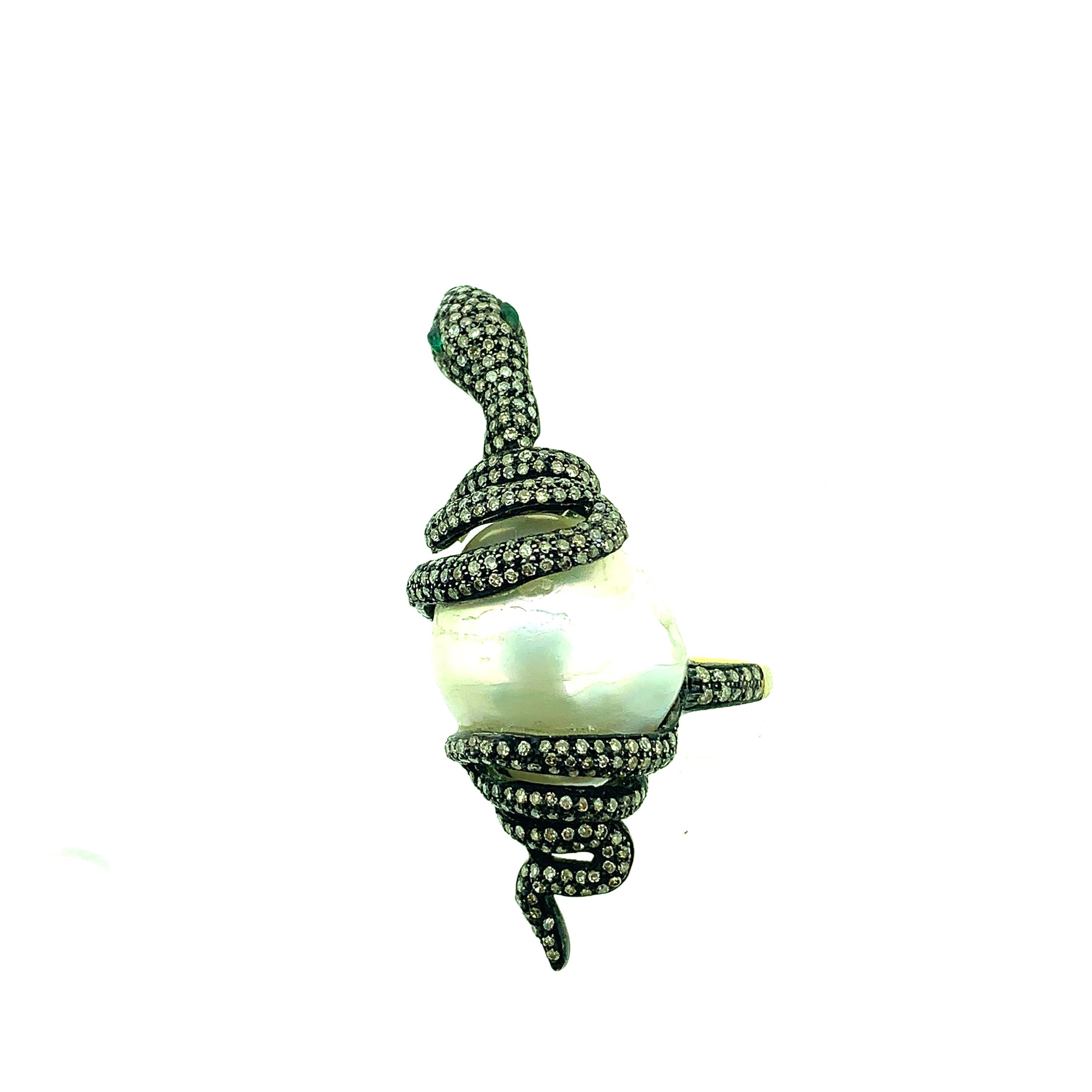 31.37 ct Pearl, 0.17ct Emerald Eyes ,and 1.95 ct Champagne Diamonds Snake Ring set in Oxidized Sterling Silver with 14K Gold Shank. One of a kind snake ring made with pure love for snakes . The color combination of pearls works wonders with emerald