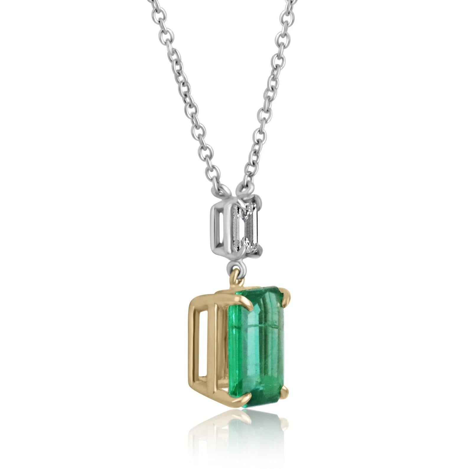 Take a look at this stunning rare vivid dark high-quality emerald and emerald cut diamond accent dangle necklace. The natural fine emerald features a vibrant strong dark green color and displays very good luster and eye clarity. Accented at the top,