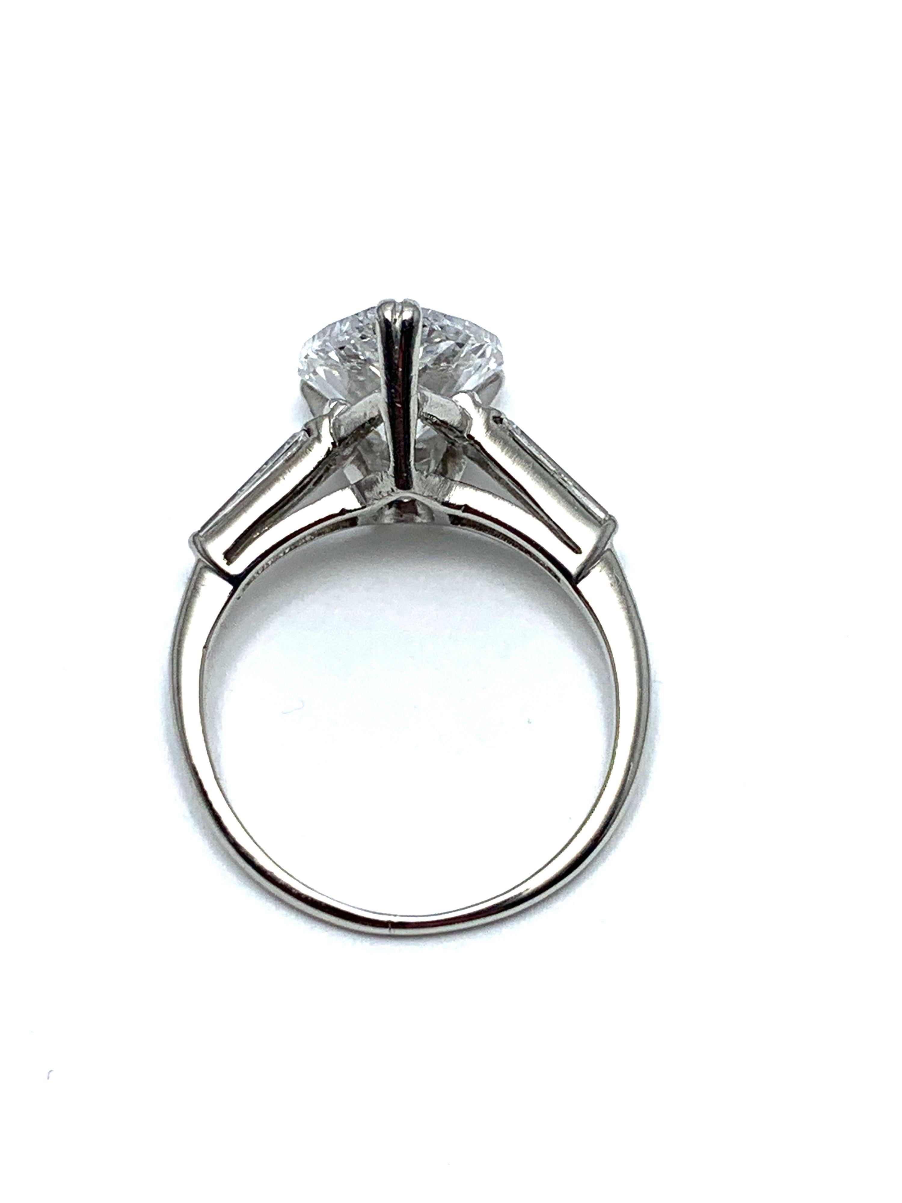 3.14 Carat D SI1 Pear Shape Diamond and Baguette Diamond Platinum Ring In Excellent Condition For Sale In Chevy Chase, MD