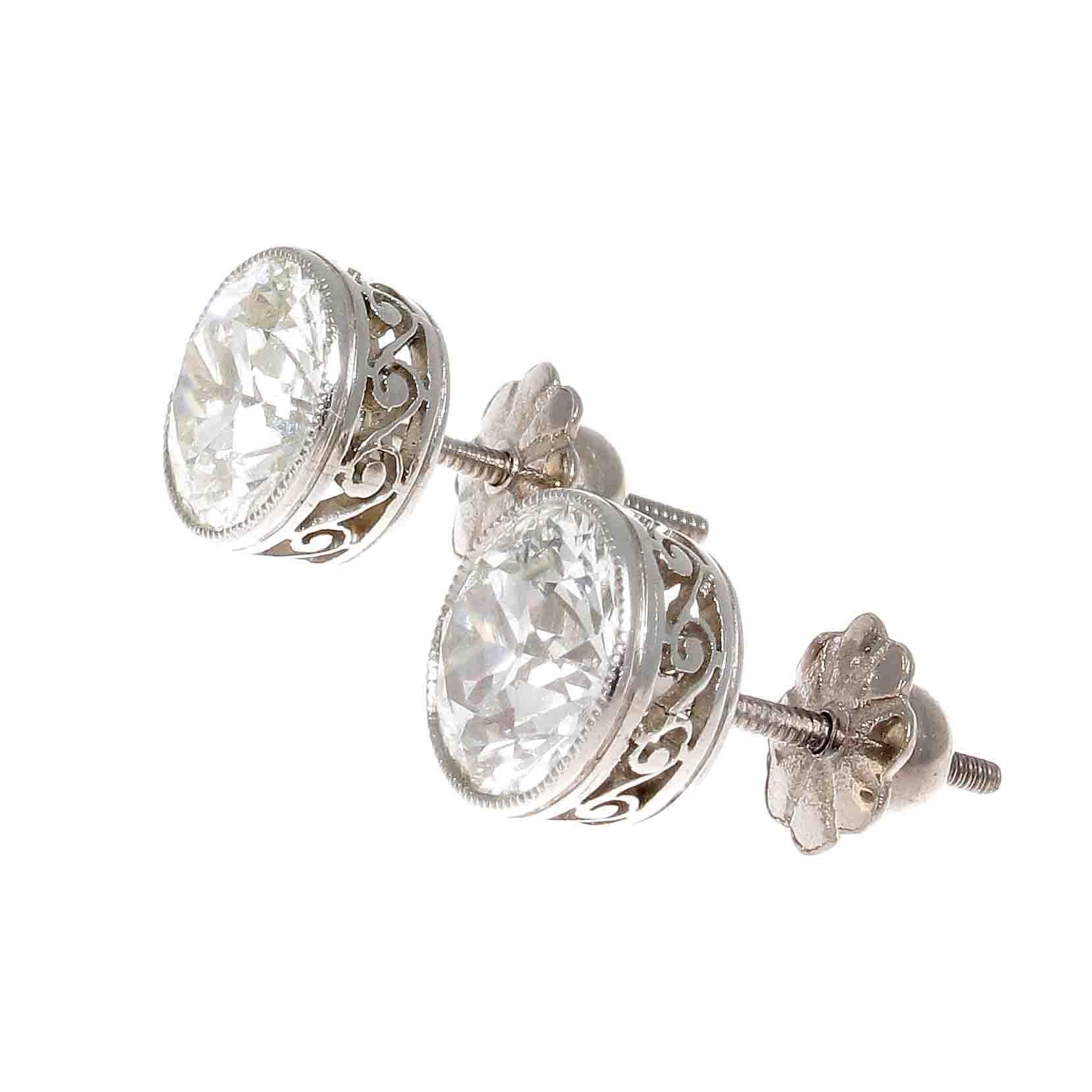 Large diamond stud earrings expertly cut to maximize the diamonds sparkle. Either at evening functions or just out and about in jeans in the afternoon these earrings will be appreciation from onlookers. Featuring two old European cut diamonds that