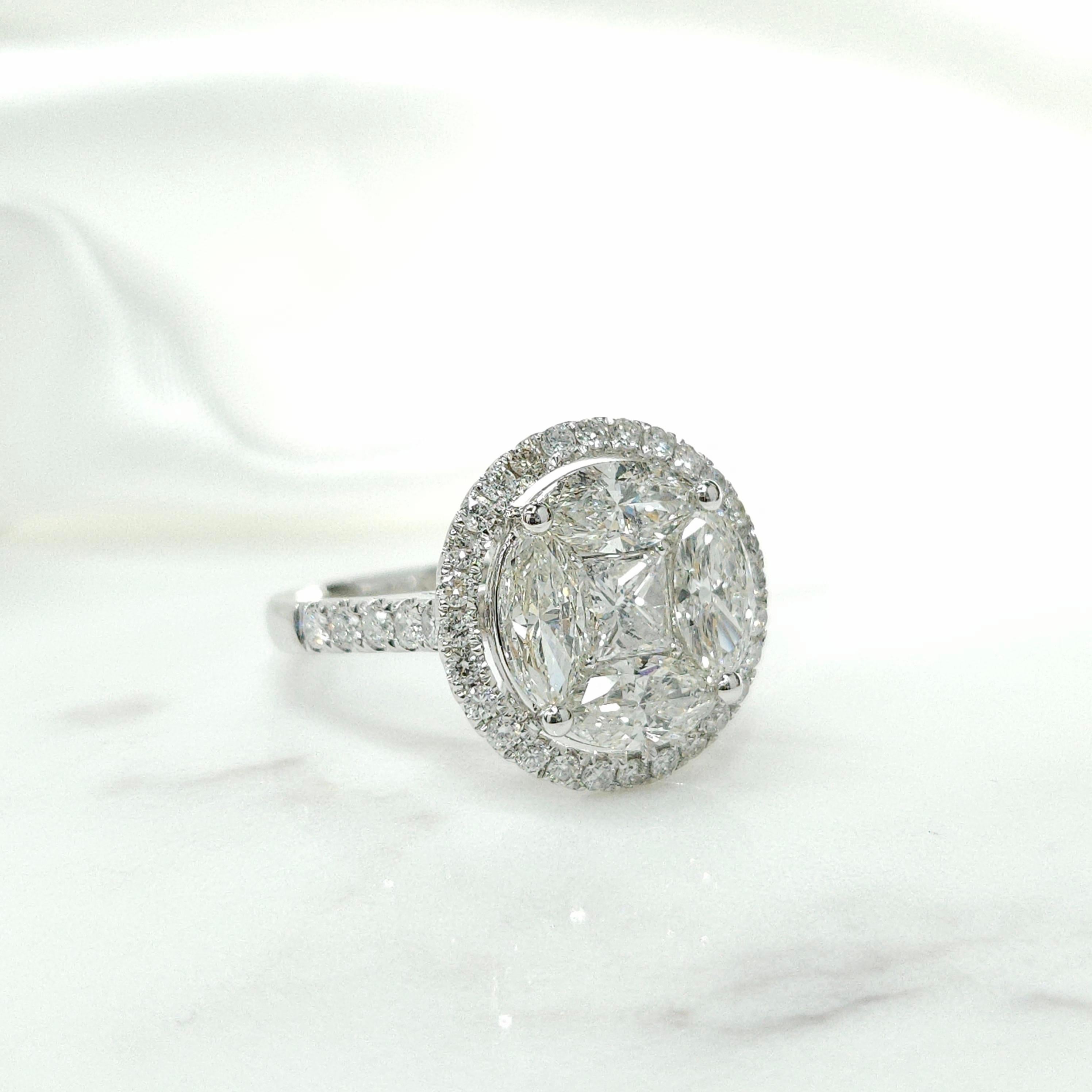 Prepare to be captivated by the exquisite 18K white gold natural white diamond ring, a true masterpiece of fine jewelry craftsmanship.

At the heart of this breathtaking design is a captivating illusion setting, featuring a stunning princess cut