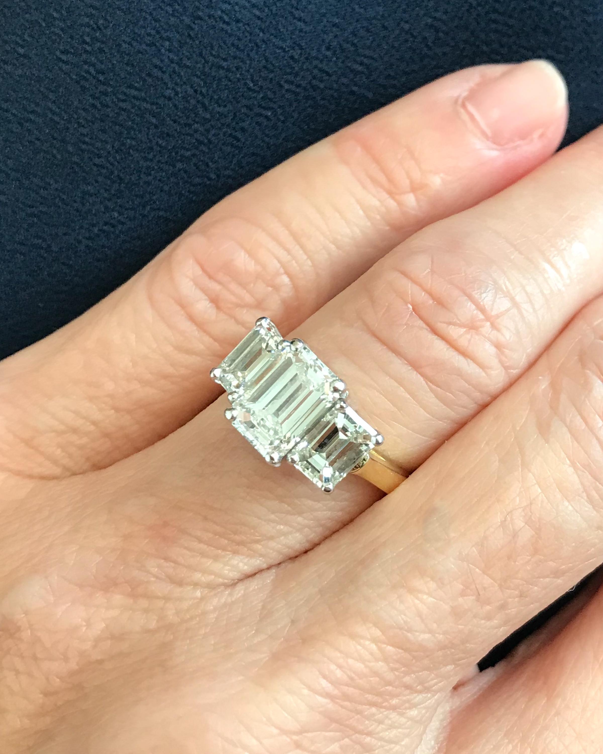 3.14 Carat Total Diamond, Platinum, 18 Karat Gold Three-Stone Emerald Cut Ring 4