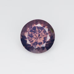 3.14 cts, spinelle rond laiteux violet orangé à facettes, couleur très inhabituelle