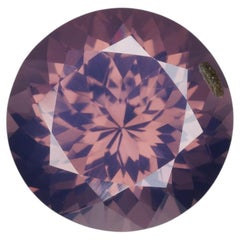 3.14 cts, spinelle rond laiteux violet orangé à facettes, couleur très inhabituelle