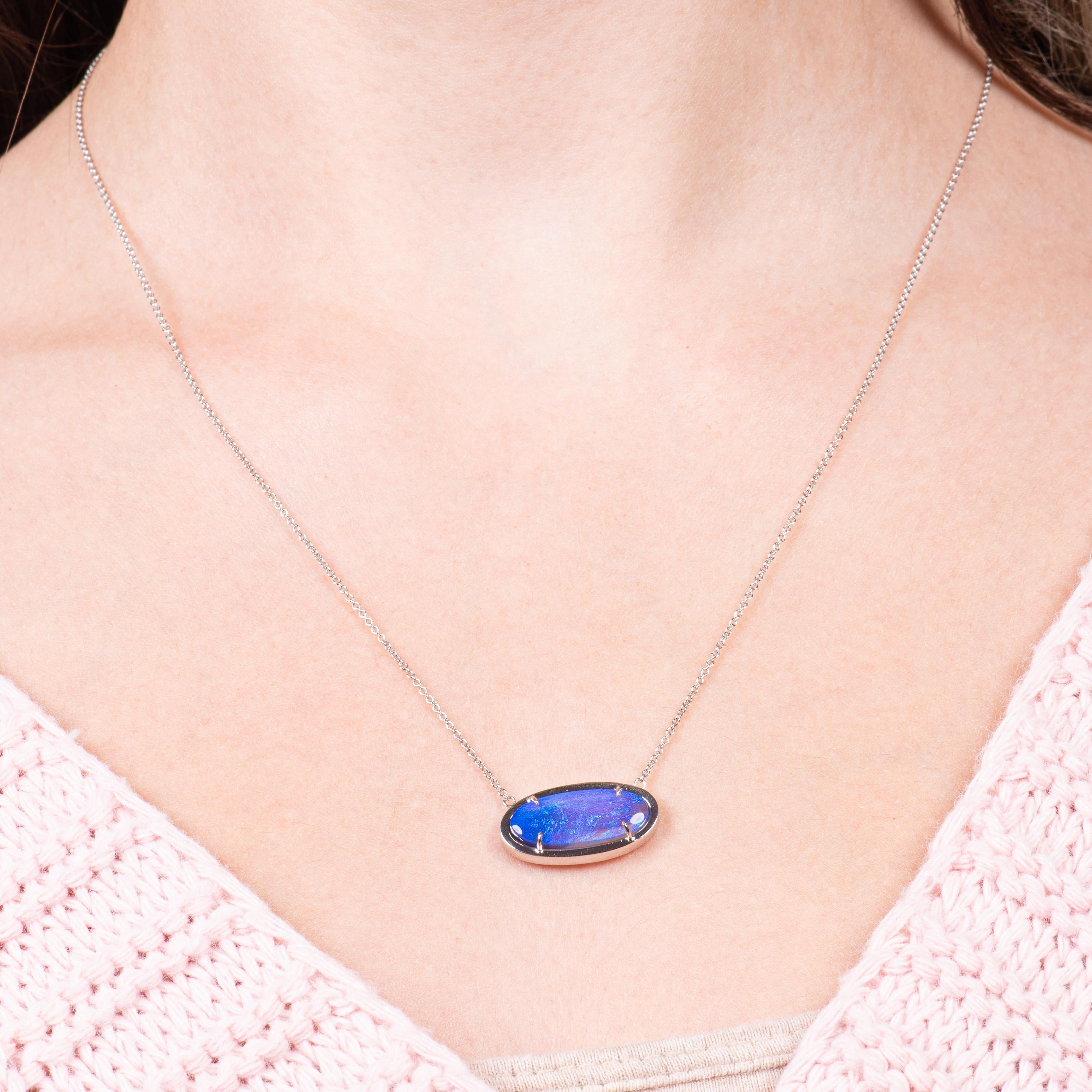 This pendant features a 3.14ct Lightning Ridge Australian blue opal set in 18kt white gold.