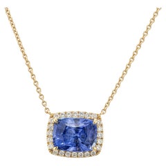 Collier de saphir bleu de 3,14ct avec halo de diamant en or jaune 18K