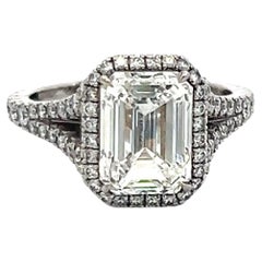 Anello di fidanzamento aureolato con diamante taglio smeraldo G VS2 in platino con GIA, 3,14