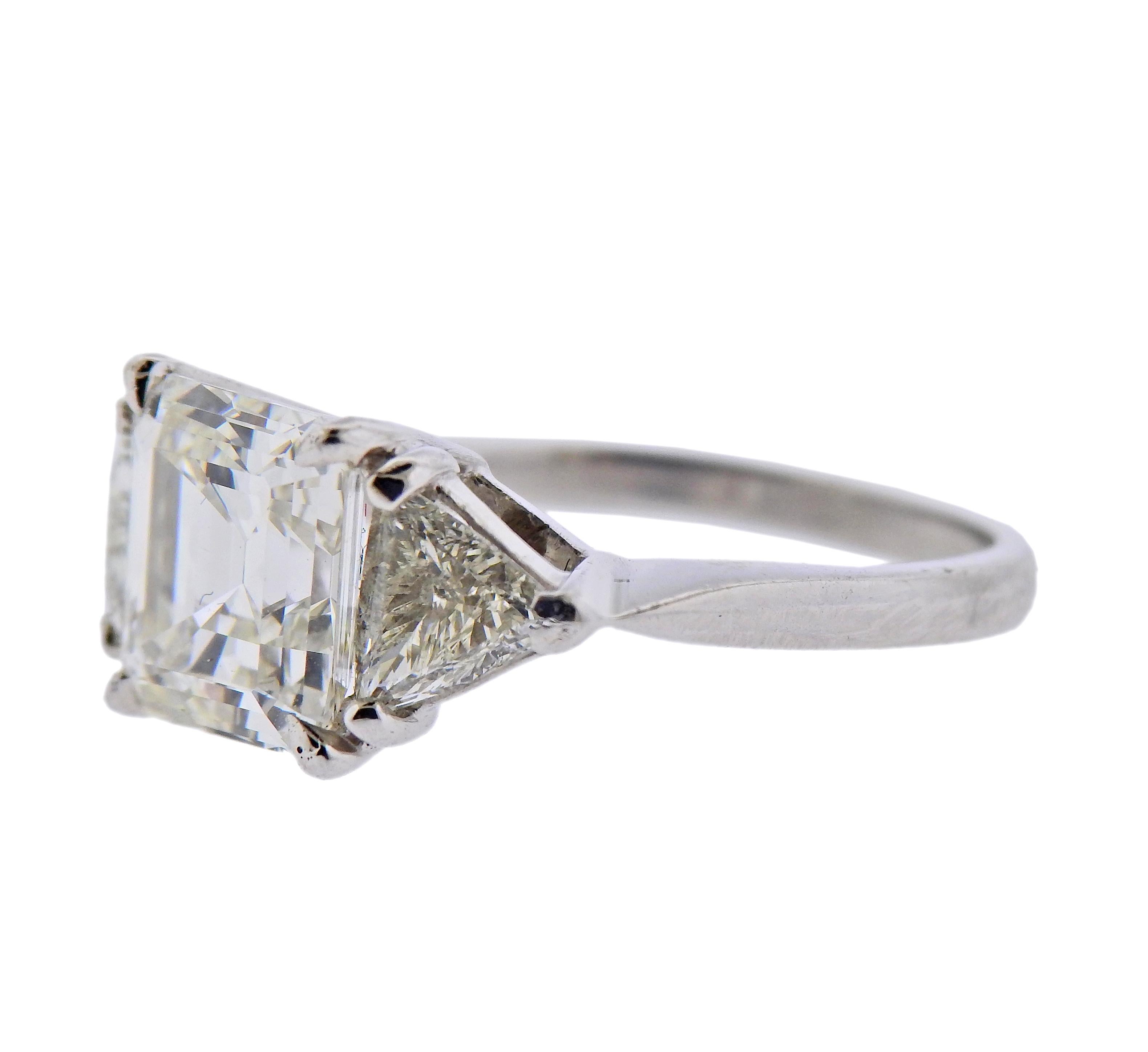 Platinum engagement ring, with center approx. 3.15ct I VS1 diamond, and side two trillion diamonds - 1.10cts. Ring size - 6.5, ring top is 9mm wide. 
