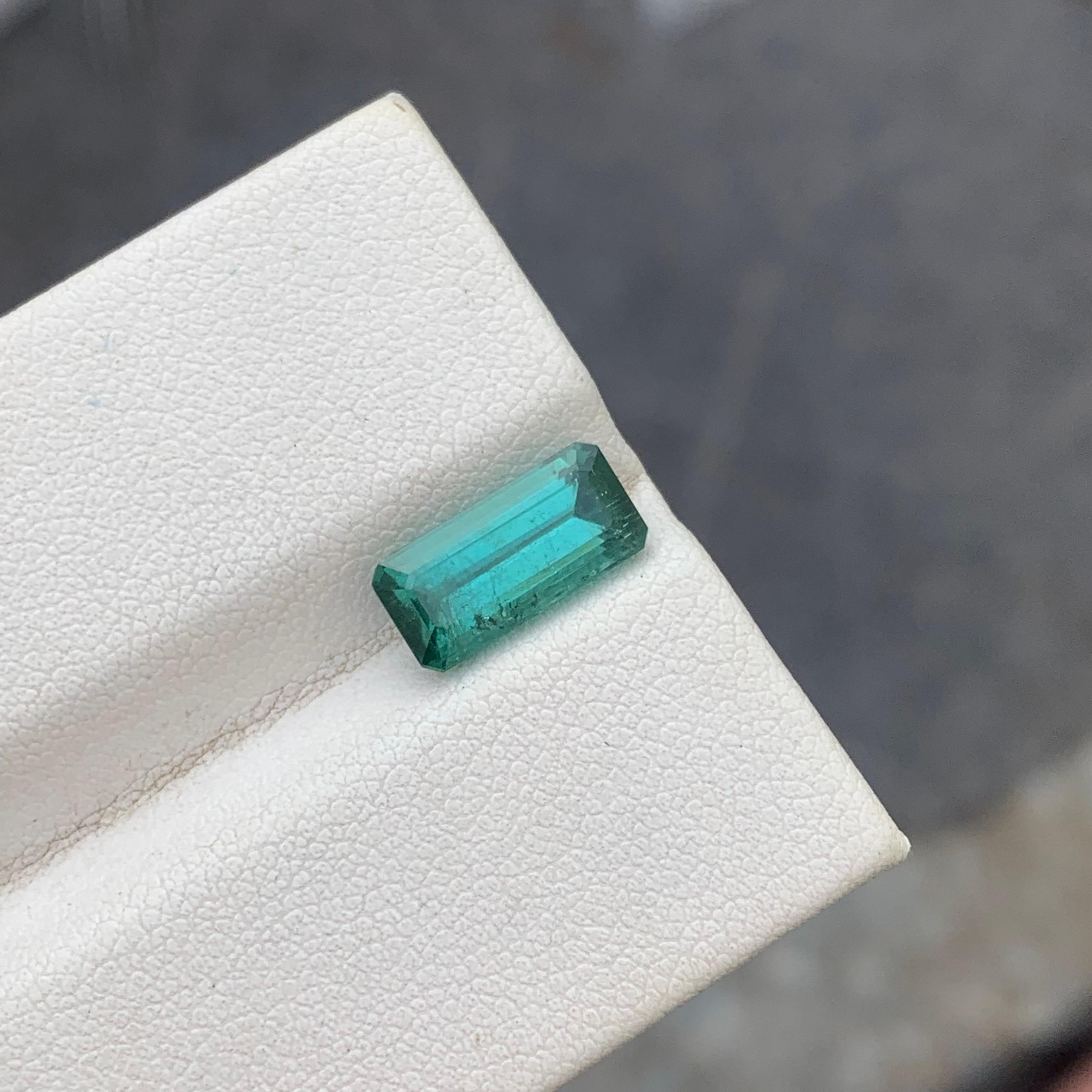 Gemstone Type : Tourmaline
Weight : 3.15 Carats
Sizes: 12x5.7x5.1 Mm
Origin : Kunar Afghanistan
Clarity :Included
Shape: Emerald 
Color: Bluish green ( Lagoon)
Certificate: On Demand
Basically, mint tourmalines are tourmalines with pastel hues of