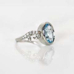 3.15 Carat Natural Oval Cut Blue Topaz Ring