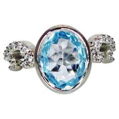 3.15 Carat Natural Oval Cut Blue Topaz Ring