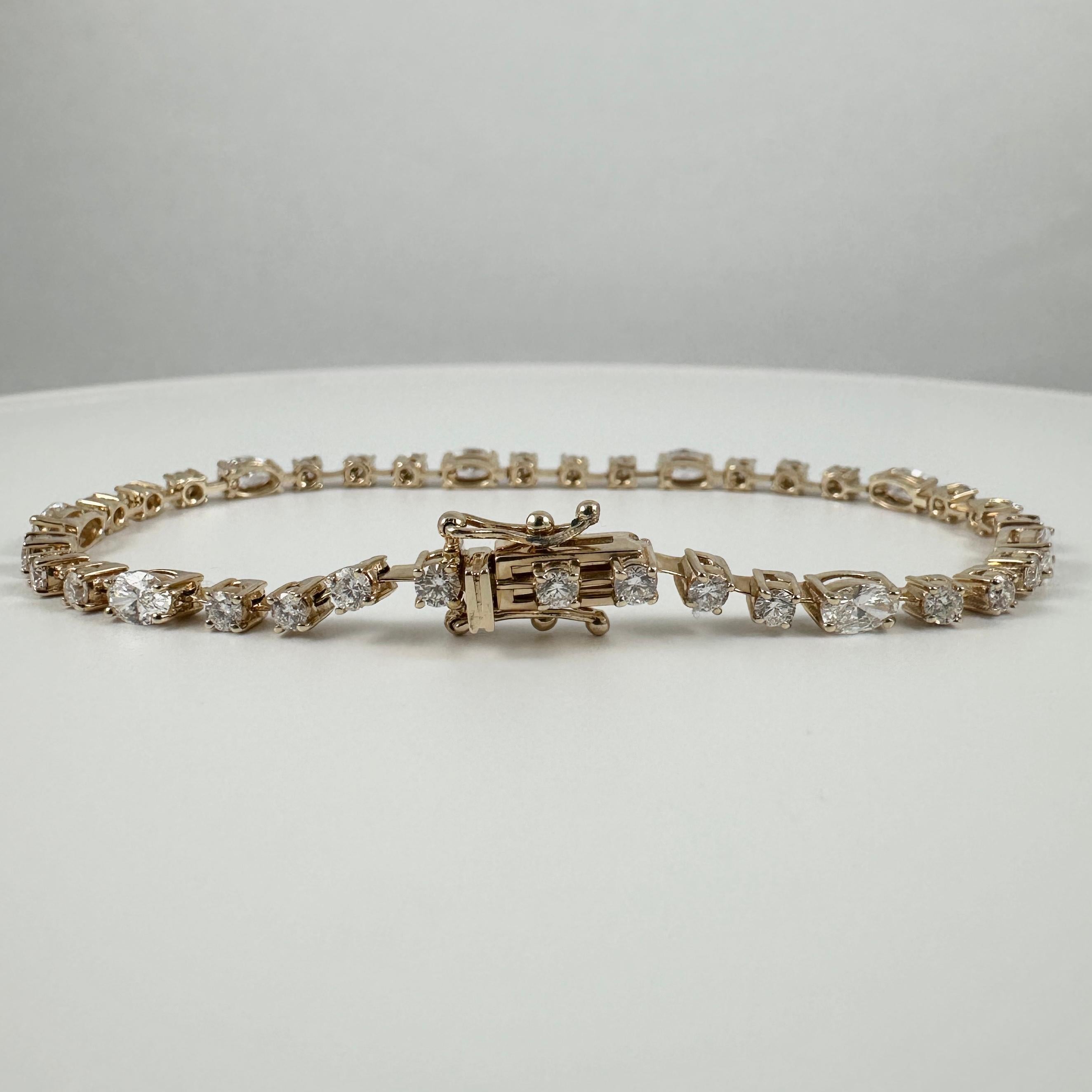 Bracelet de tennis en or jaune 14K avec diamants ovales et ronds de 3,15 carats, 7 pouces en vente 1