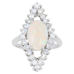 Vintage 3.15 Carat Oval Cabochon Cut Opal and Diamond Ring, 14 Karat White Gold Halo