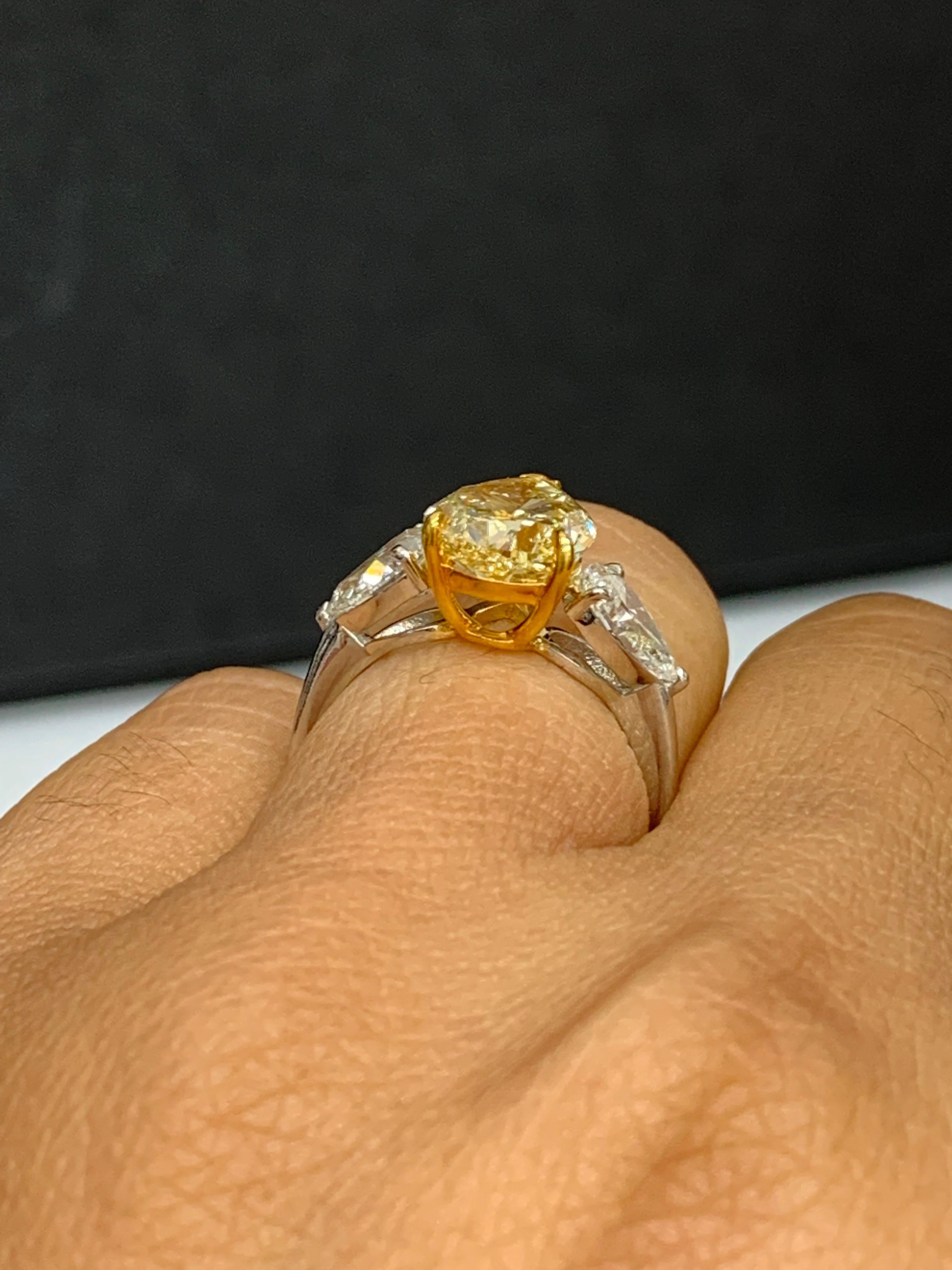 yellow diamond three stone ring