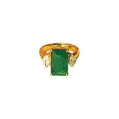 3.15 Carats, Natural Zambian Emerald 
Marquise Diamonds Engagement Ring
