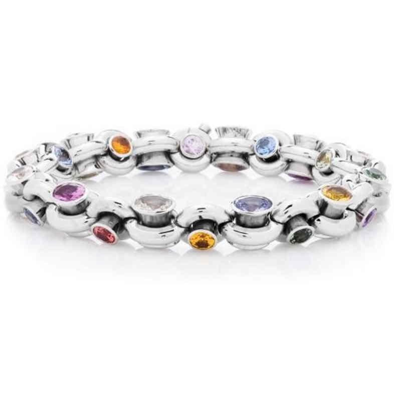 A rare and beautiful rainbow of multi colored Genuine Sapphire Bracelet. Forty-eight oval 24 Round and 24 Oval Sapphires are bezel set in twin back to back mountings that are encircled in highly polished round gold links so that each pair of