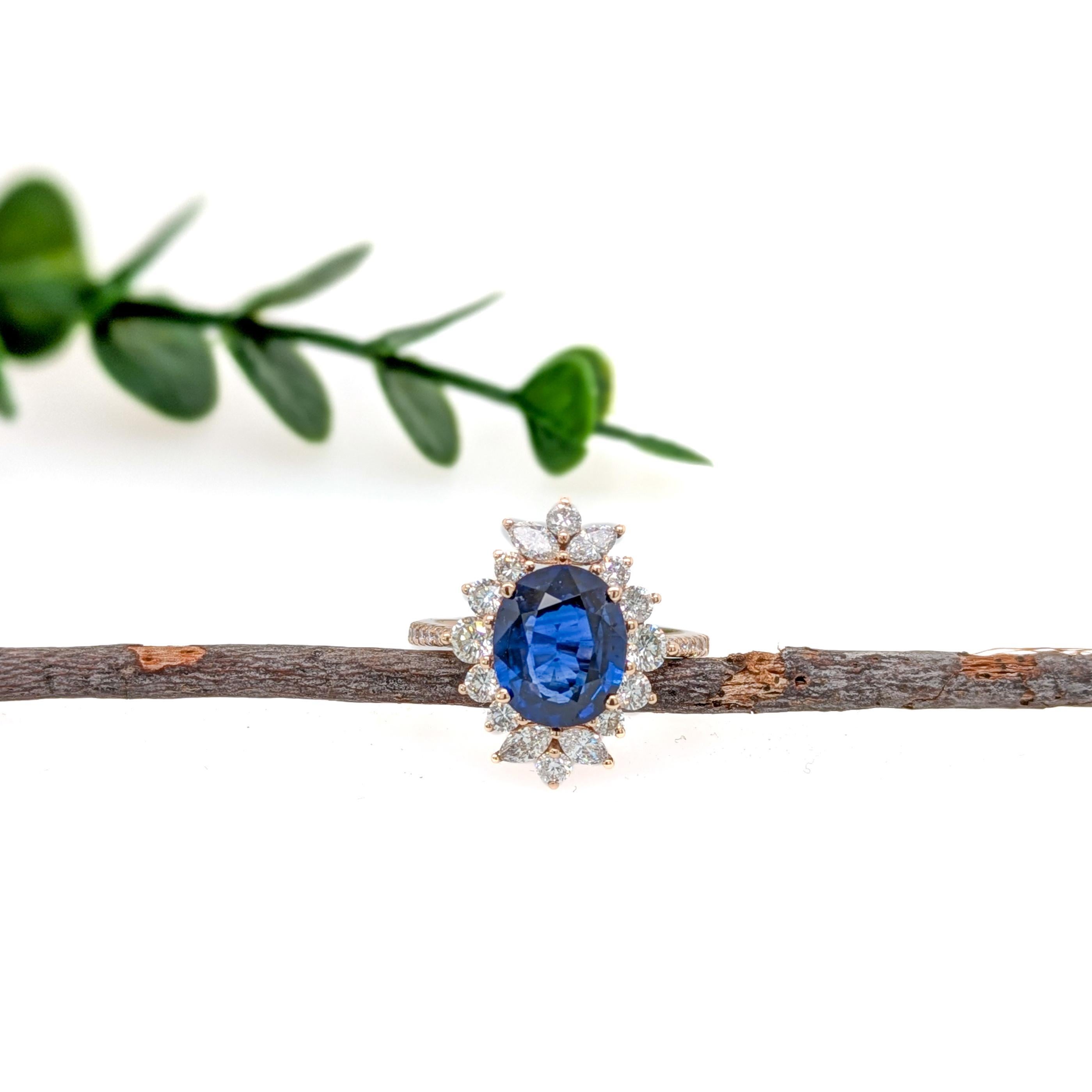 A breathtaking oval blue sapphire takes center stage in this 14K yellow gold statement ring, surrounded by a halo of sparkling, earth-mined diamonds. A true symbol of luxury and refinement. This sapphire ring can be a beautiful September birthstone