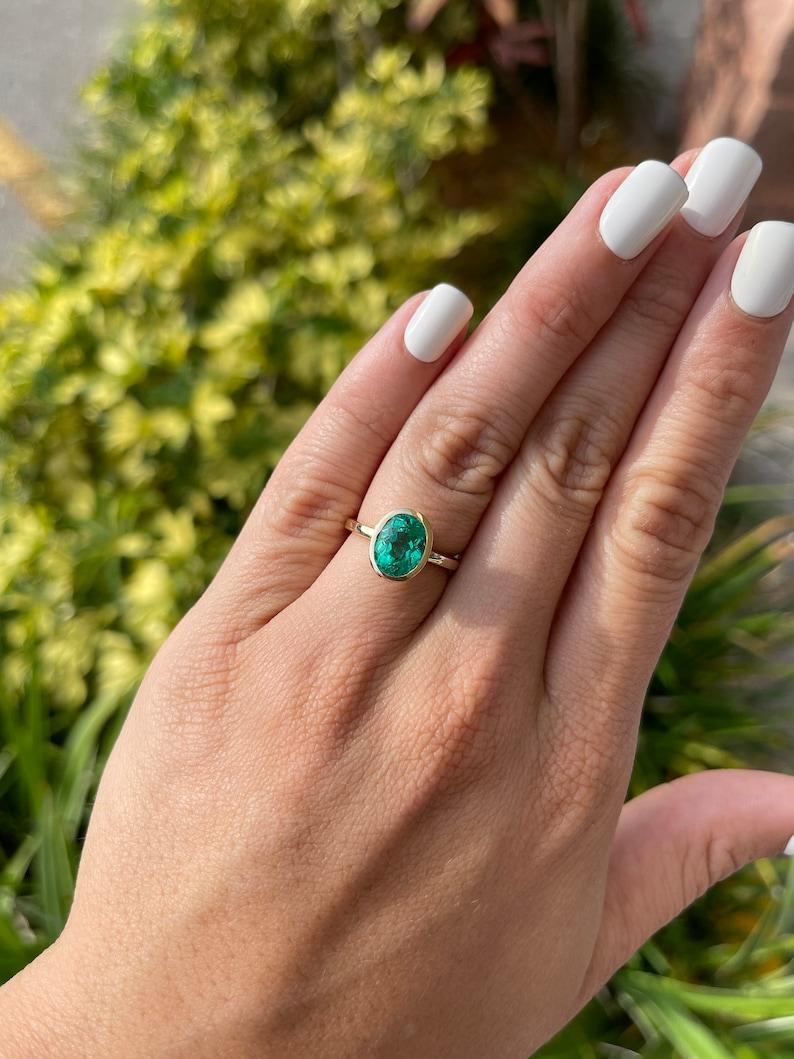 Oval Cut 3.15cts 18K Bezel Set Oval Emerald Engagement Ring  Yellow Gold For Sale
