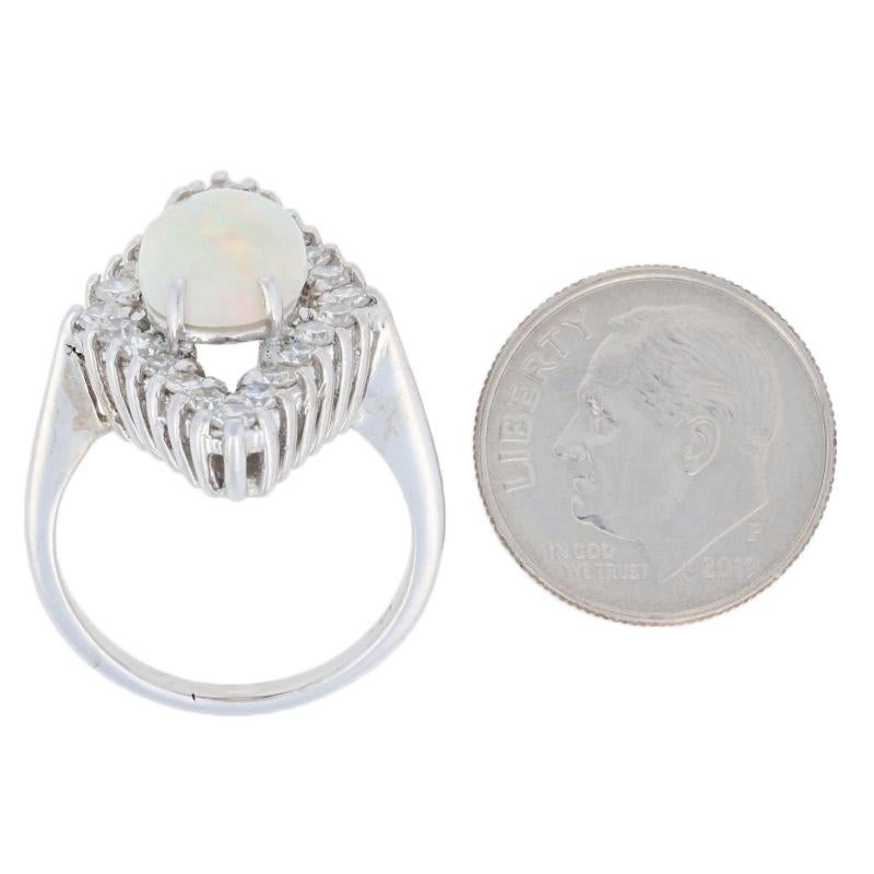3.15 Carat Oval Cabochon Cut Opal and Diamond Ring, 14 Karat White Gold Halo 1