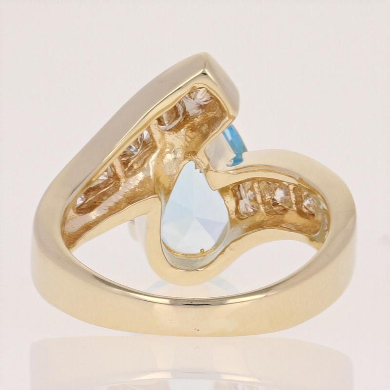 3.15 Carat Pear Cut Aquamarine and Diamond Ring, 14 Karat Yellow Gold Bypass In Excellent Condition In Greensboro, NC