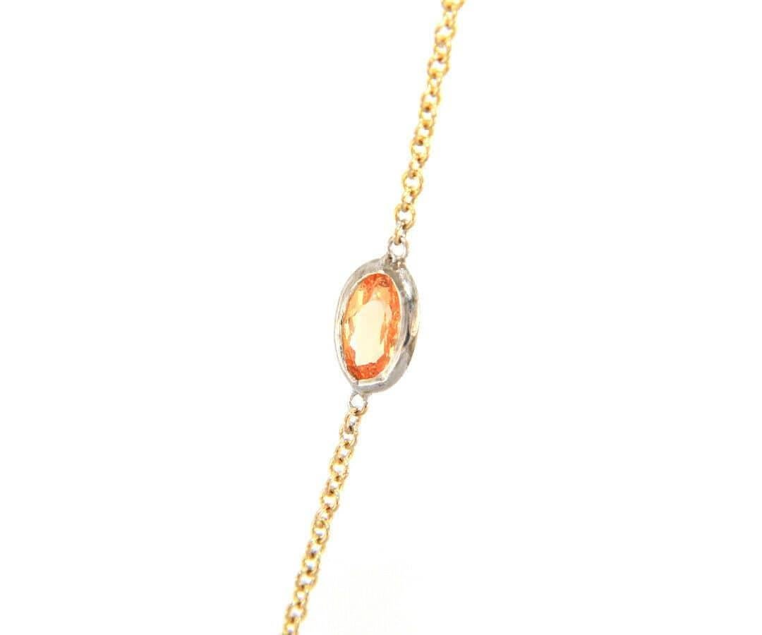 Oval Cut 3.15ctw Spessartite Garnet and 0.76ctw Diamond Station Necklace in 14K For Sale