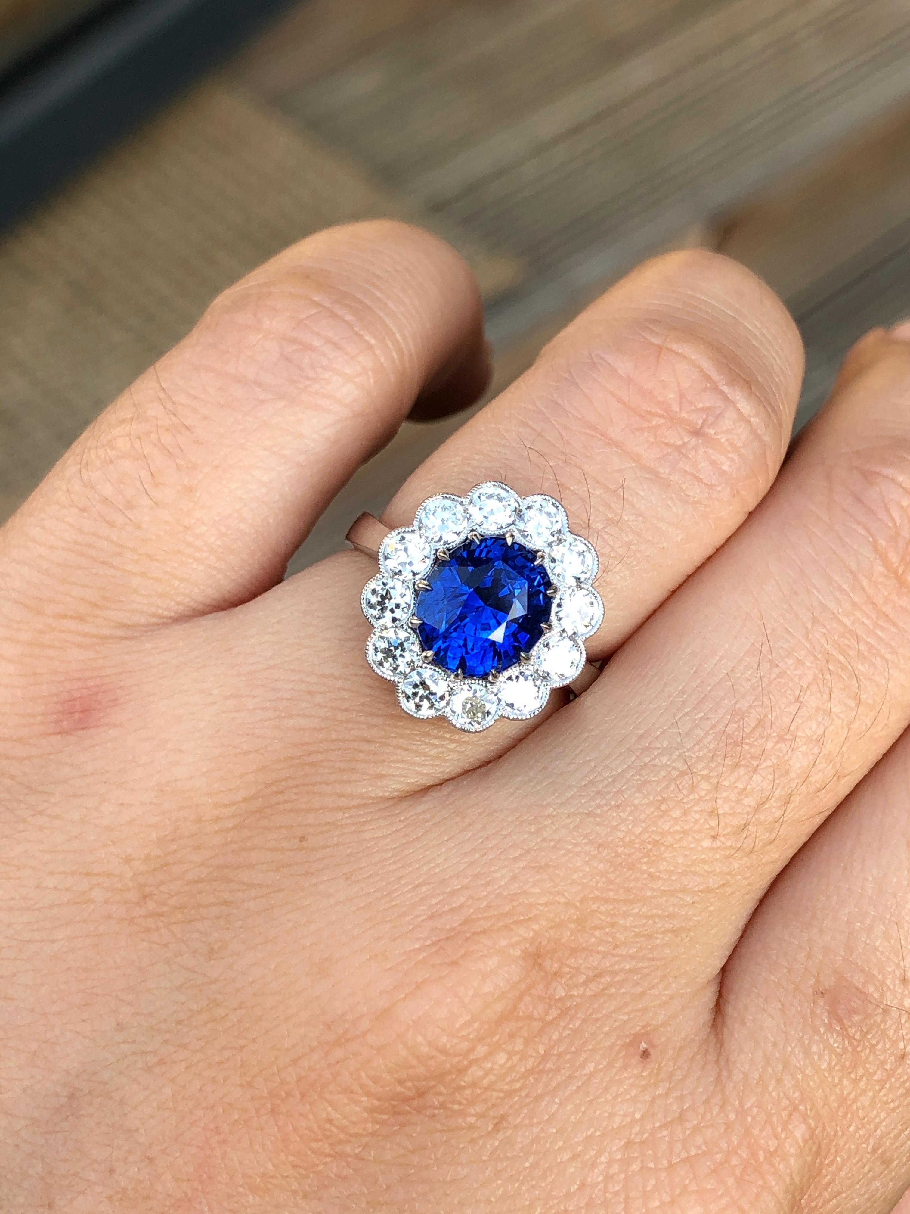 Round Cut 3.16 Carat Blue Sapphire and Diamond Cluster Engagement Ring