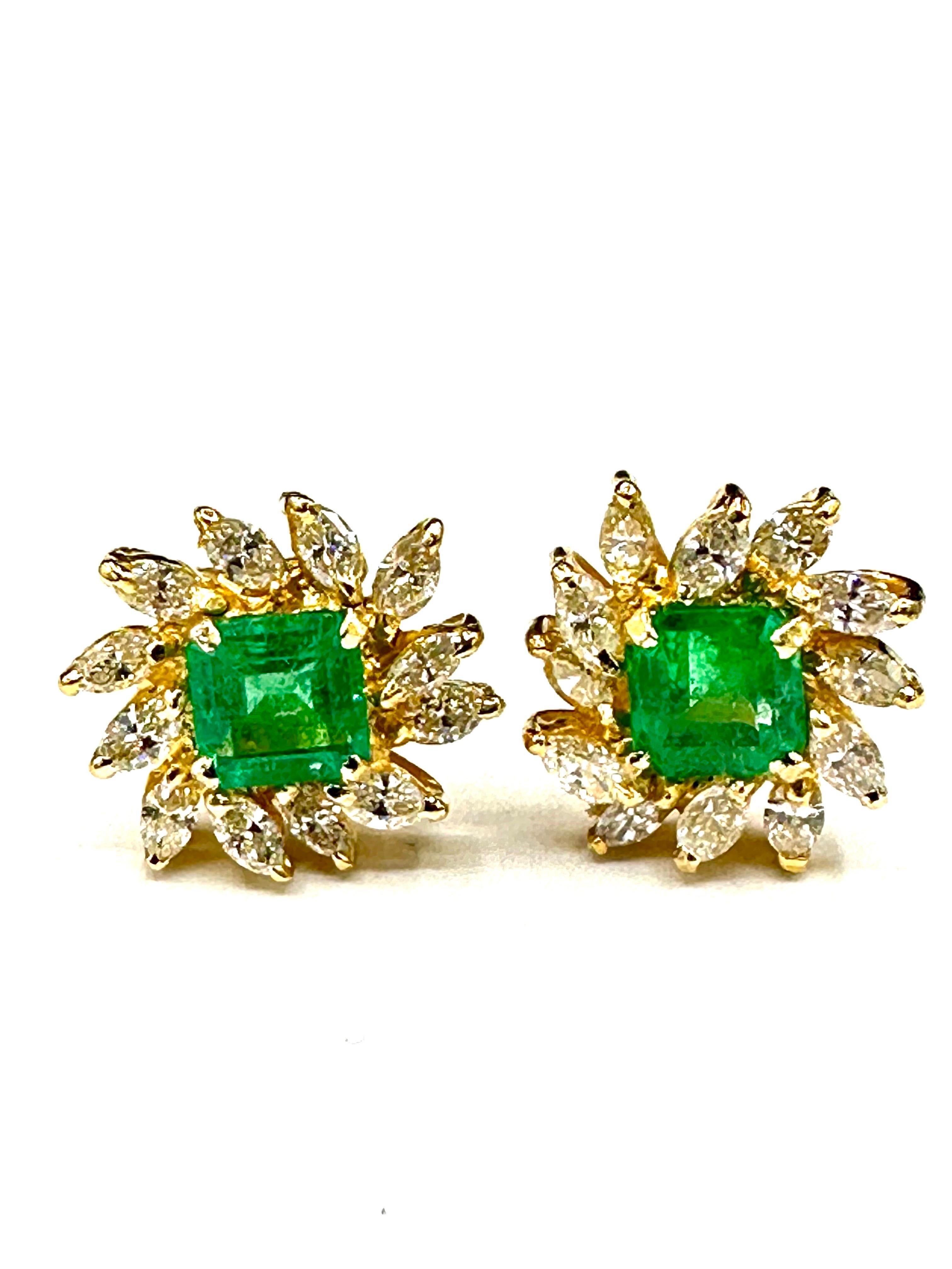 A gorgeous set of Emerald and Diamond earrings!  The Emeralds are set in four prongs, with a single row of diagonally set marquise Diamonds surrounding.  There are two Emeralds with a total weight of 3.16 carats, and 24 Diamonds with a total weight