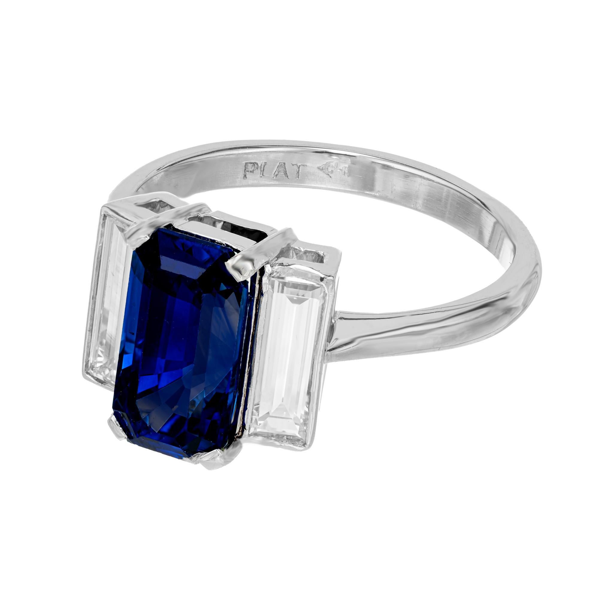 emerald cut diamond and sapphire ring