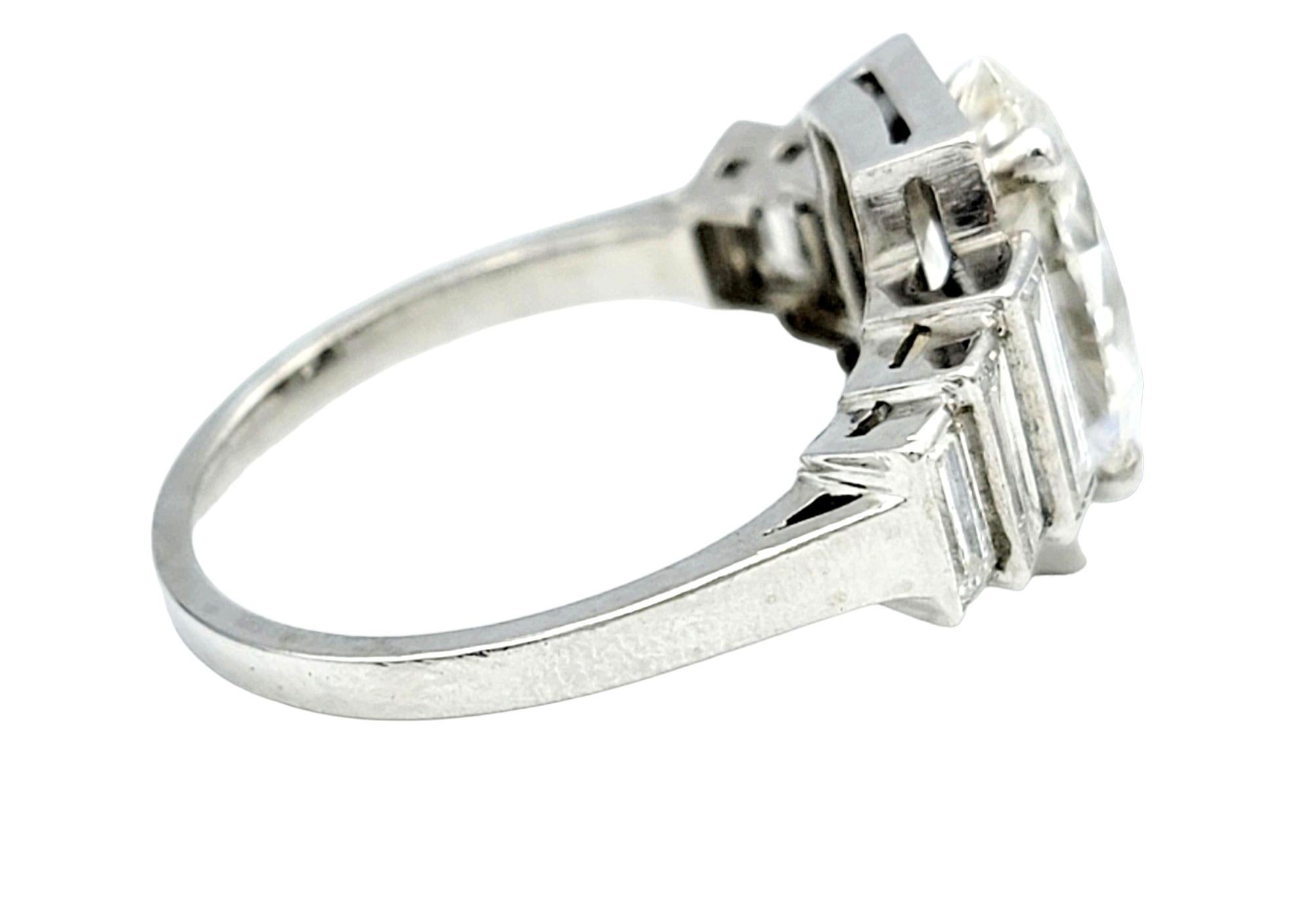 Marquise Cut 3.16 Carat Total Art Deco Marquise and Tapered Baguette Diamond Ring in Platinum For Sale