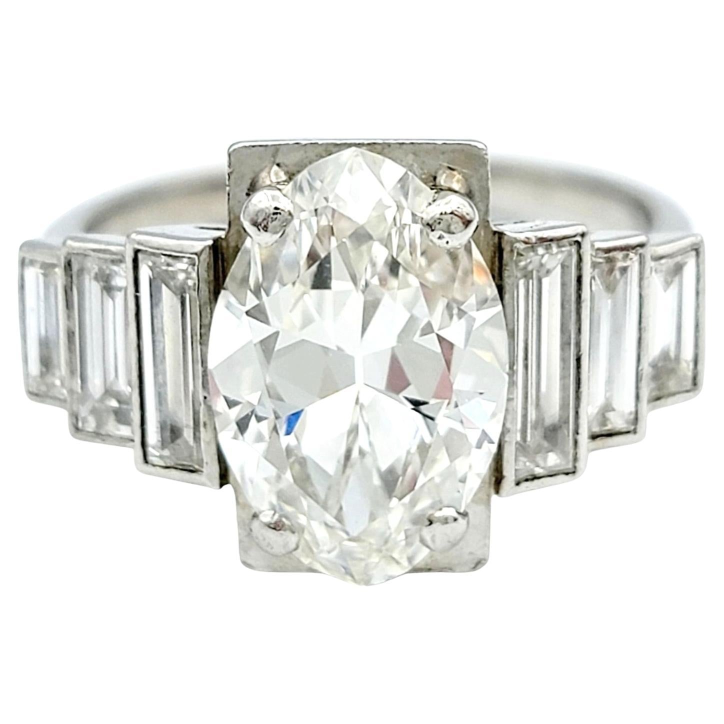 3.16 Carat Total Art Deco Marquise and Tapered Baguette Diamond Ring in Platinum For Sale