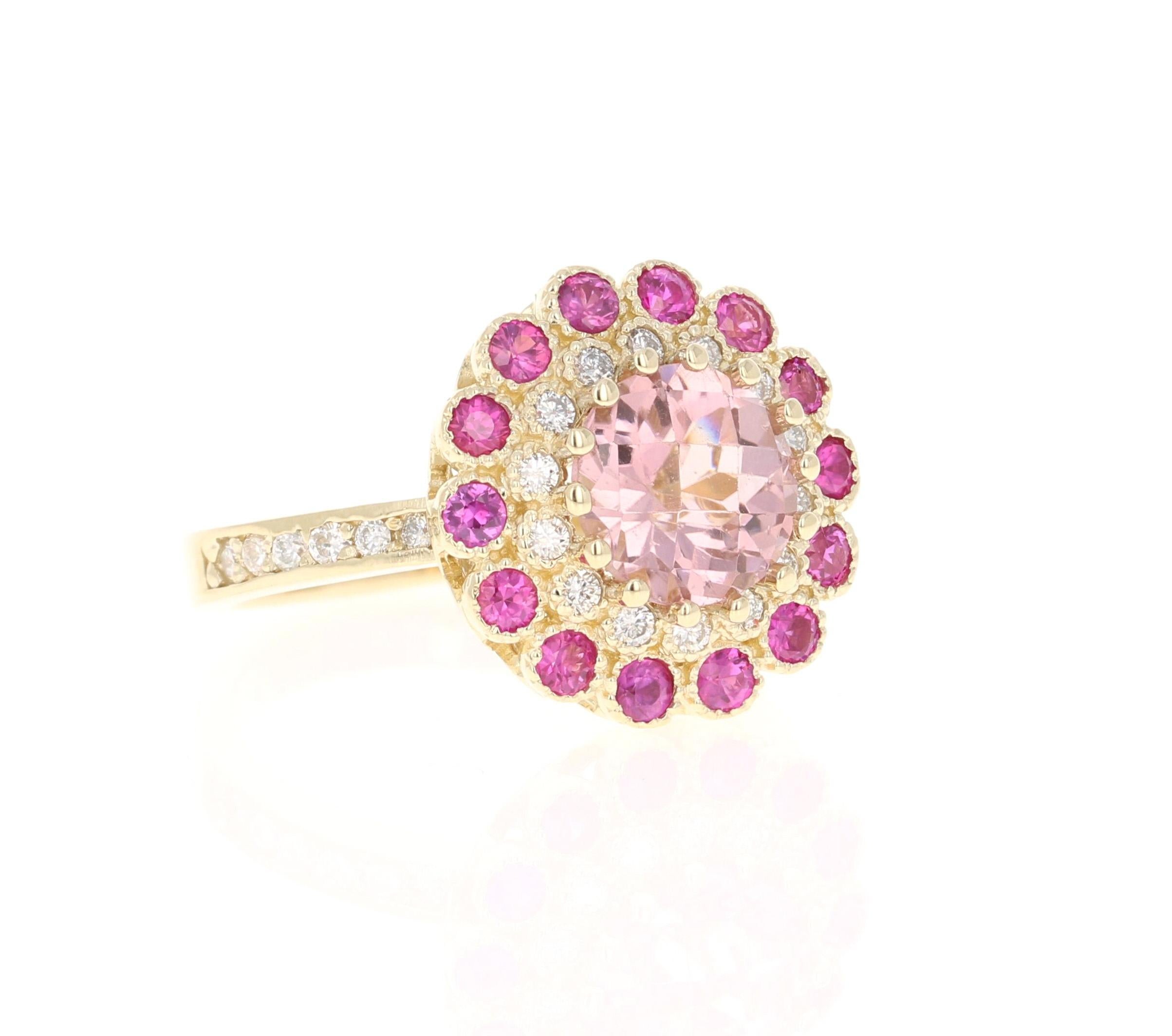 This ring has a round blush pink checkered cut tourmaline that weighs 2.08 carats and 14 pink sapphires that weigh 0.74 carats. There are also 26 round cut diamonds that weigh 0.34 carats. The total carat weight of the ring is 3.16 carats. 

This