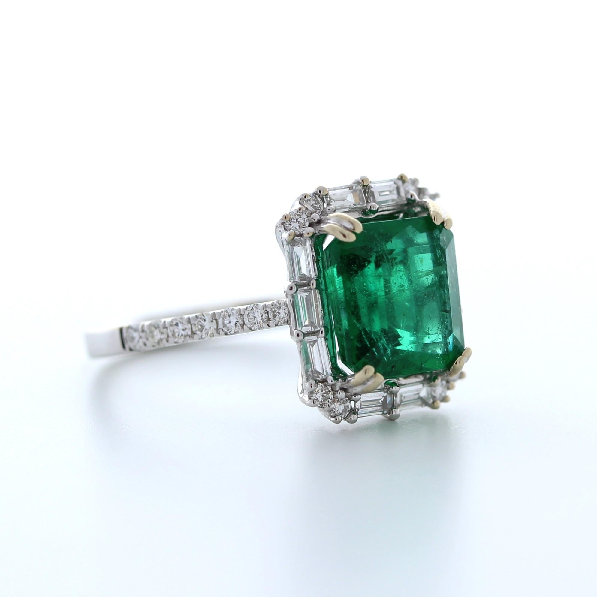 This stunning 3.16 carat weight green emerald fashion ring is a gorgeous and eye-catching choice for any occasion. The emerald is a beautiful shade of green and boasts exceptional clarity and brilliance, weighing in at 3.16 carats. It is set in