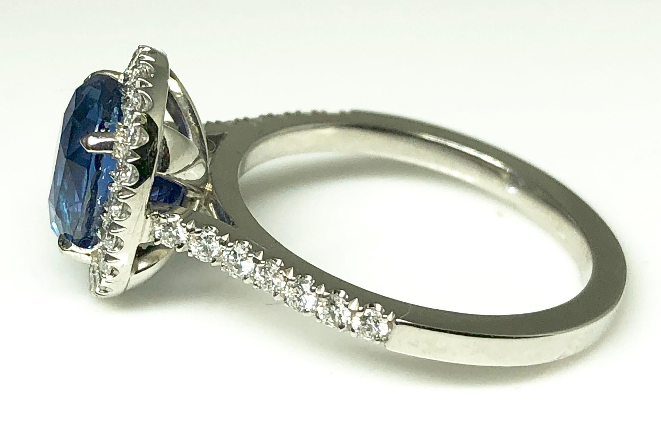 3.17 carat Blue Sapphire and  Halo Cluster Diamond ring in Platinum 4