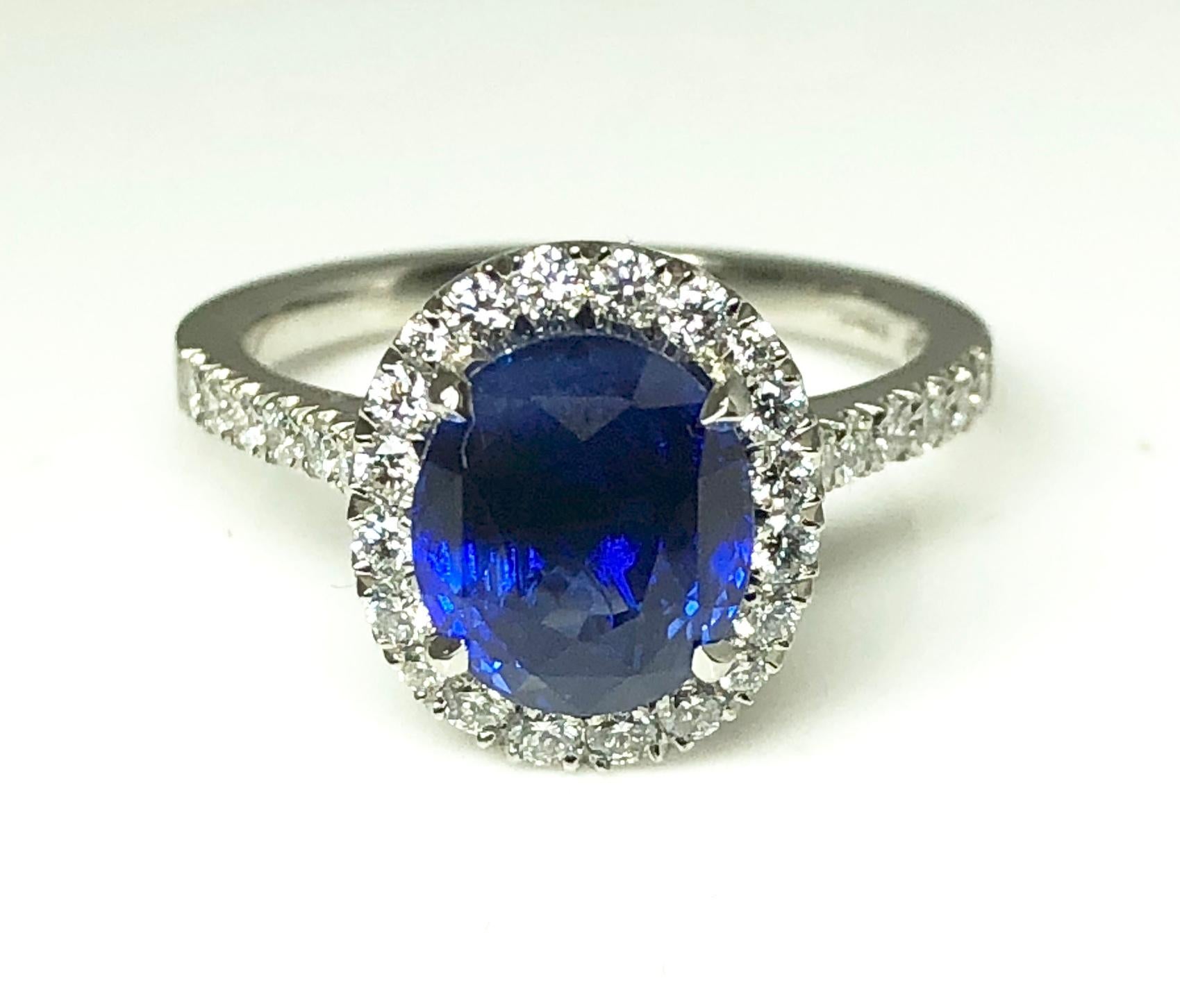 3.17 carat Blue Sapphire and  Halo Cluster Diamond ring in Platinum 2