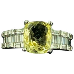 3.17 Carat Cushion Cut Yellow Sapphire 
Diamond Ring